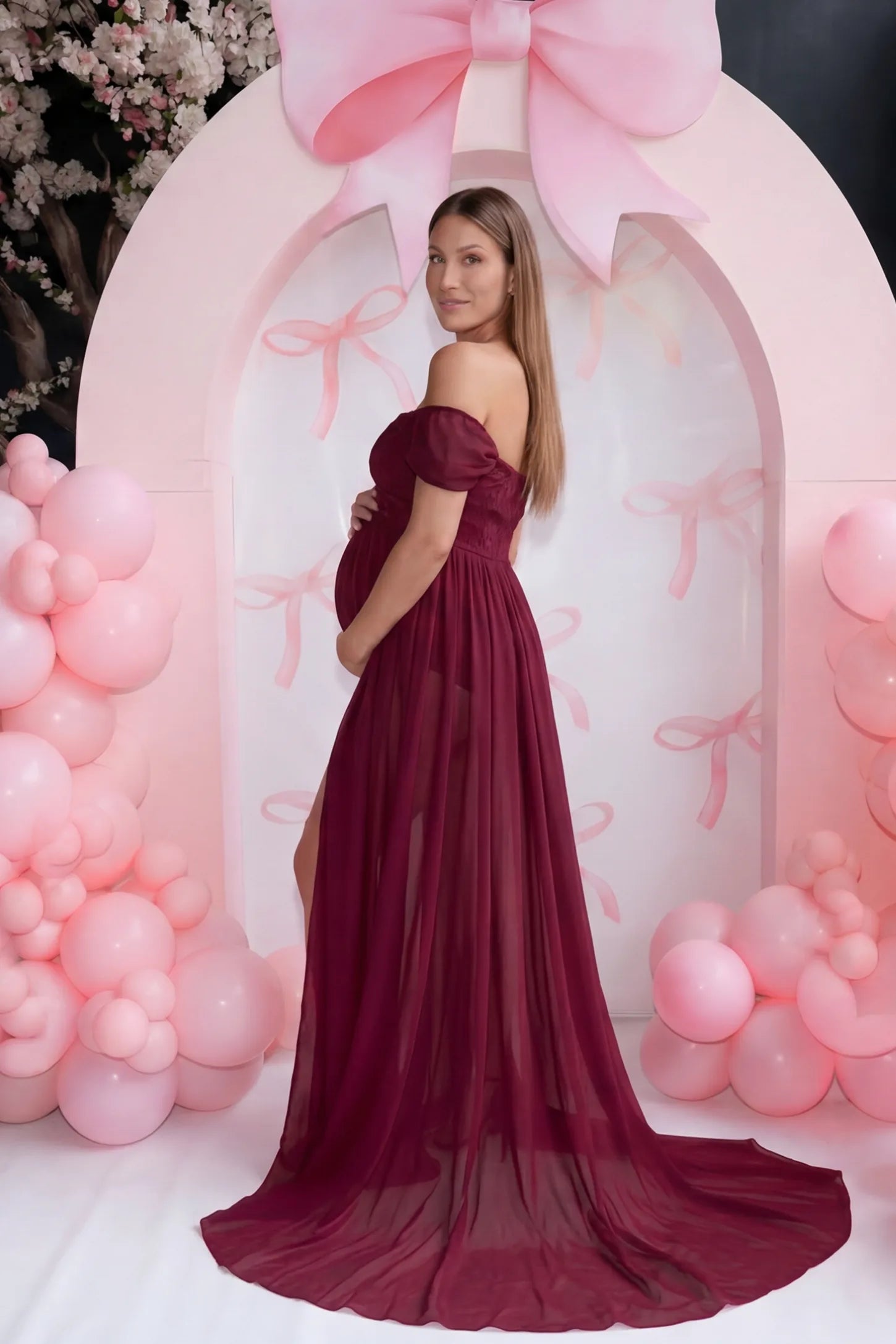 Chiffon Split-Front Maxi Maternity Photoshoot Gown Chiffon Split-Front Maxi Maternity Photoshoot Dress in Burgundy featuring a floor-length chiffon skirt on a rear-view pregnant model.