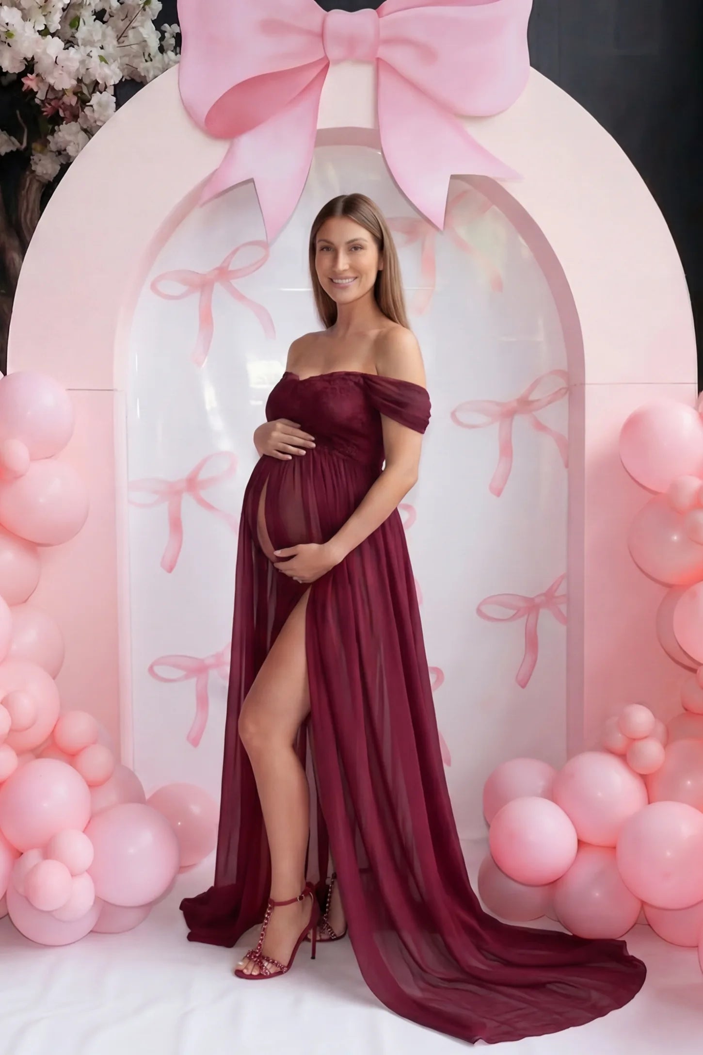 Chiffon Split-Front Maxi Maternity Photoshoot Gown Chiffon Split-Front Maxi Maternity Photoshoot Dress in Burgundy featuring a bump-flattering split on a side-profile pregnant model.