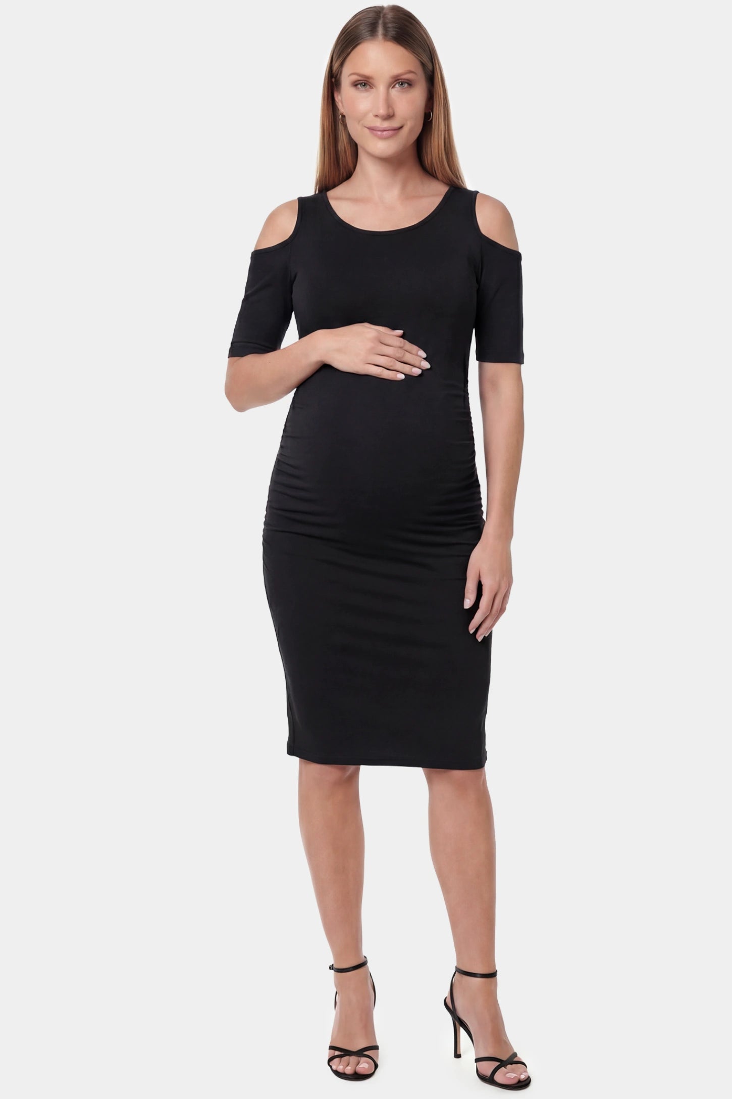 Cold Shoulder Sleeve Fitted Short Maternity Dress Cold shoulder sleeve fitted short maternity dress in black featuring soft stretch fabric in full body front view on a pregnant model