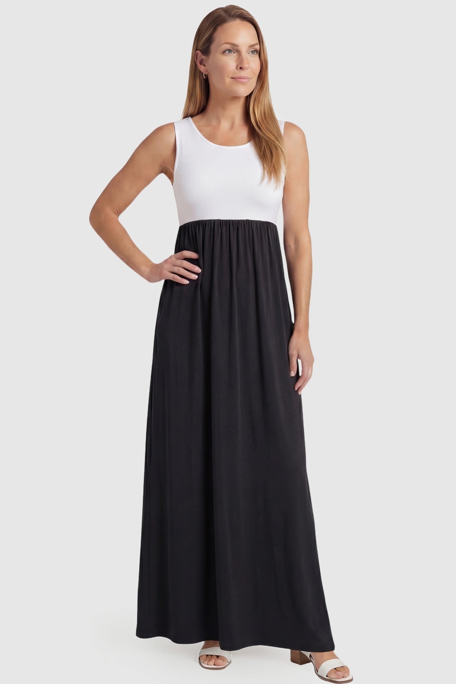 Color-Block Sleeveless Maternity Maxi Dress Color-Block Sleeveless Maternity Maxi Dress in Black featuring a transition-friendly fit on a non-pregnant model.