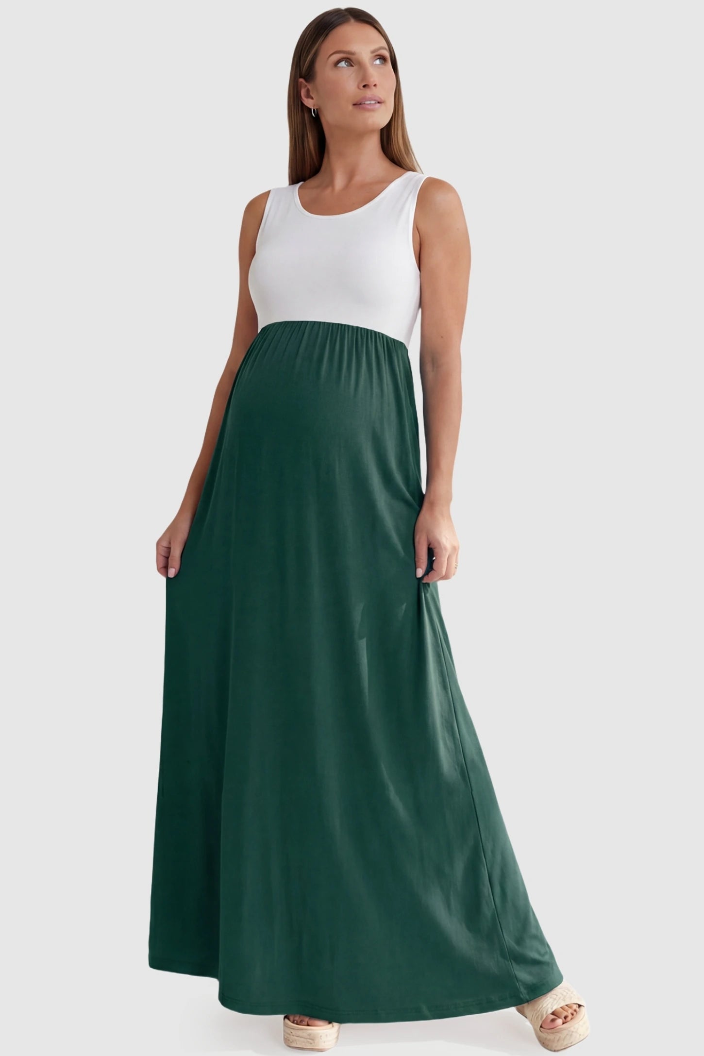Color-Block Sleeveless Maternity Maxi Dress Color-Block Sleeveless Maternity Maxi Dress in Olive Green featuring a gathered waist on a pregnant model.