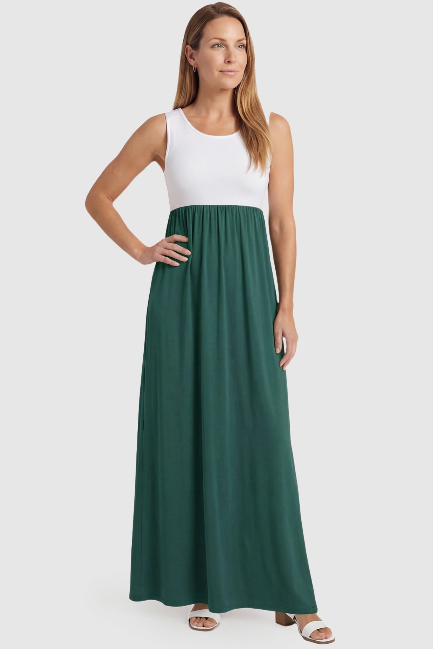 Color-Block Sleeveless Maternity Maxi Dress Color-Block Sleeveless Maternity Maxi Dress in Olive Green featuring a versatile fit on a non-pregnant model.