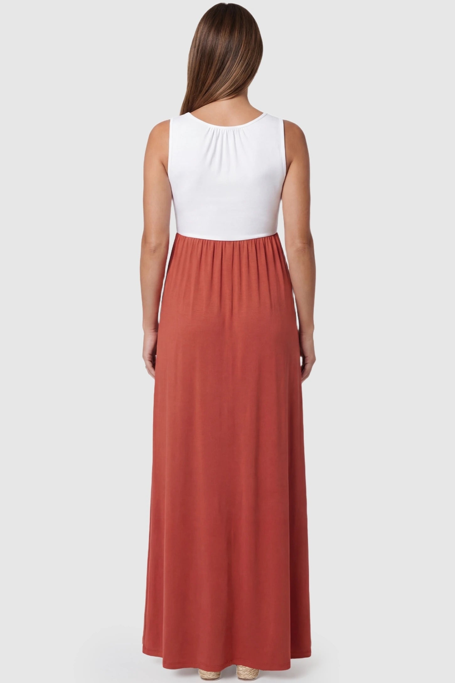 Color-Block Sleeveless Maternity Maxi Dress Color-Block Sleeveless Maternity Maxi Dress in Rose featuring a white tank-style top on a pregnant model.