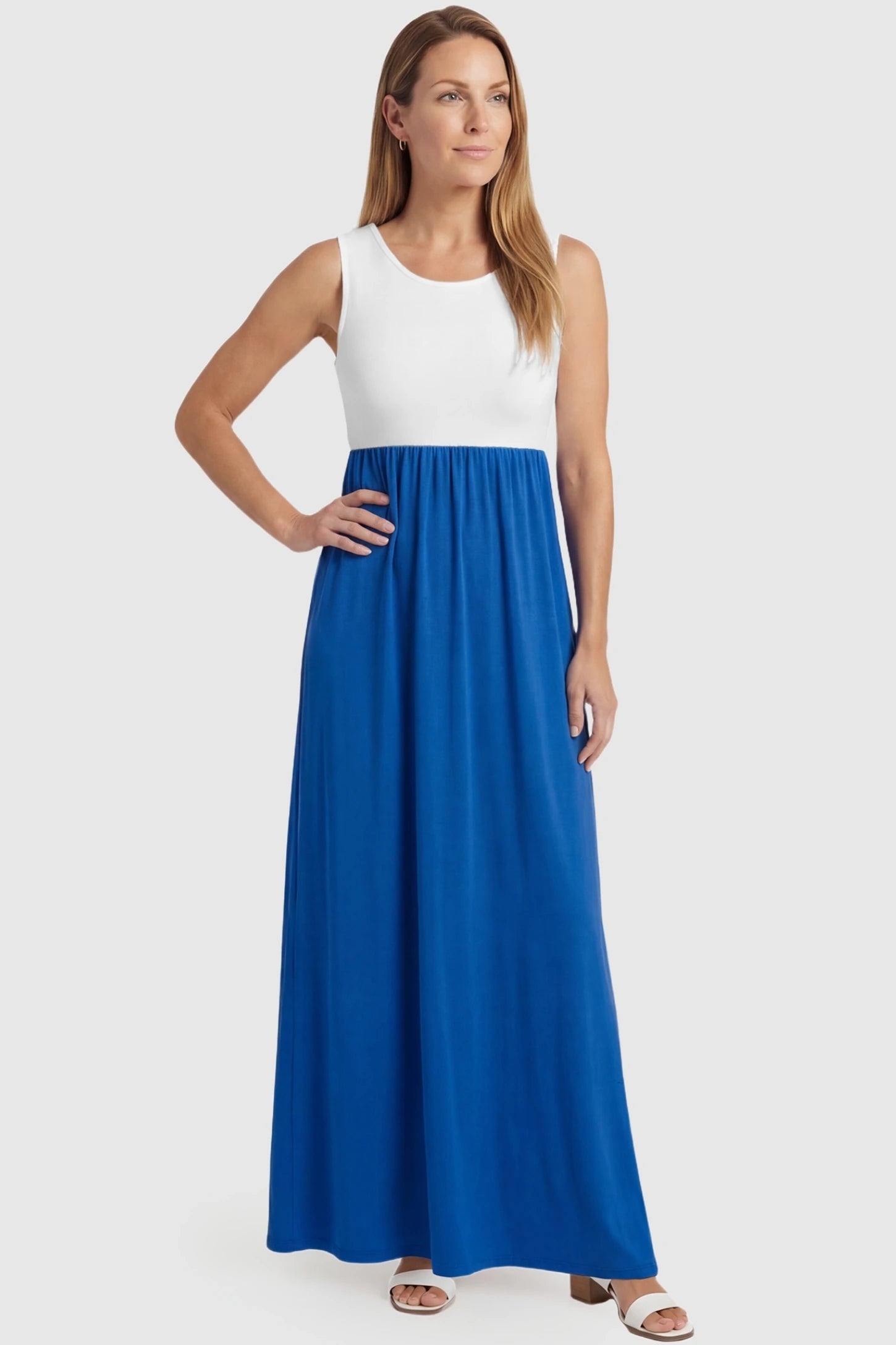 Color-Block Sleeveless Maternity Maxi Dress Color-Block Sleeveless Maternity Maxi Dress in Royal Blue featuring a scoop neckline on a non-pregnant model.