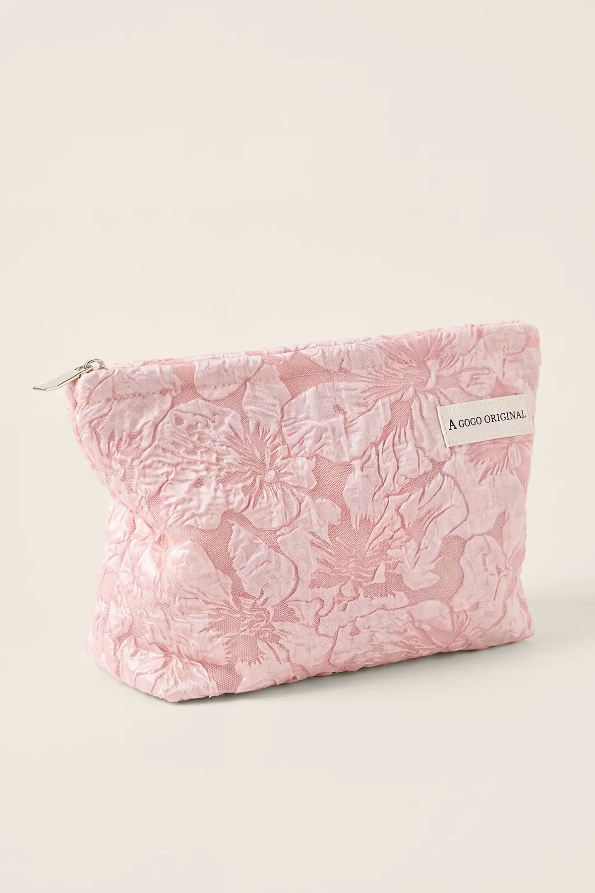 Corduroy Color-Block Travel Pouch Corduroy Color-Block Travel Pouch in Soft Pink featuring textured corduroy exterior, logo patch, and zip closure, product studio view.