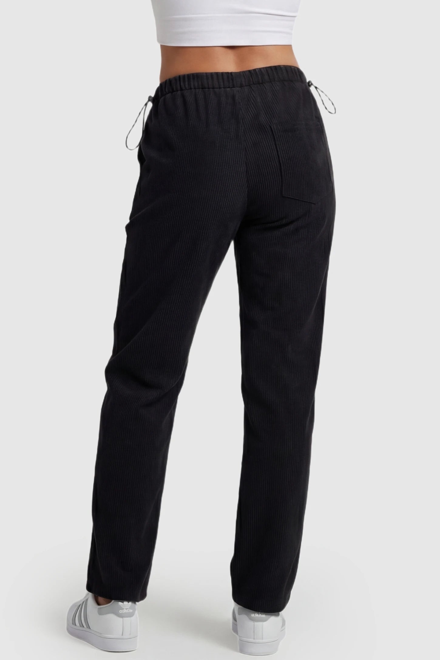 Corduroy Drawstring Waist Wide-Leg Maternity Pants Corduroy drawstring waist wide-leg maternity pants in black with soft corduroy texture and back pocket, back view on pregnant model