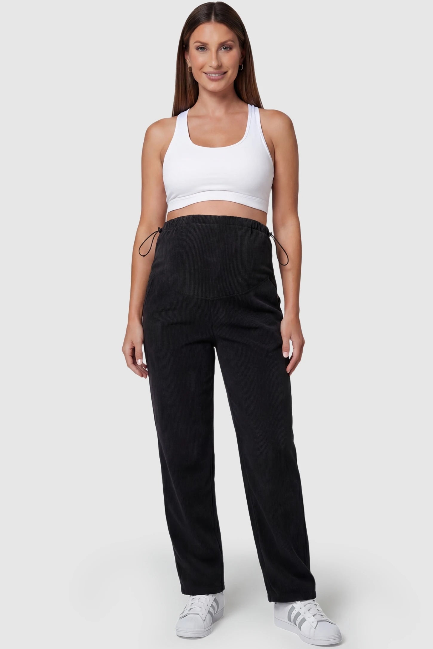 Corduroy Drawstring Waist Wide-Leg Maternity Pants Corduroy drawstring waist wide-leg maternity pants in black with relaxed wide-leg silhouette, full body on pregnant model