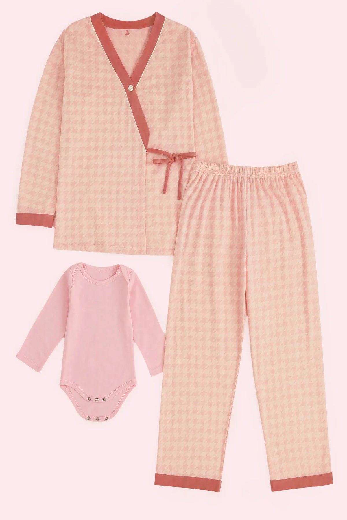 Cotton Houndstooth Nursing Pajama Set Cotton Houndstooth Nursing Pajama Set in Pink Houndstooth featuring complete two-piece sleepwear layout with kimono wrap top, long pants, and a matching baby onesie, flat lay product view.