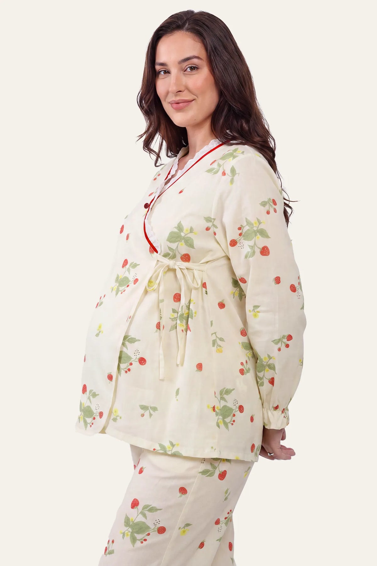 Cotton Long Sleeve Top & Pants Maternity Pajama Set Polka Dot Round Neck Flowy Maternity Top in Beige featuring a round neckline, elasticated waistband, lightweight stretch fabric, and a flattering relaxed fit on a plus size pregnant model, front view.