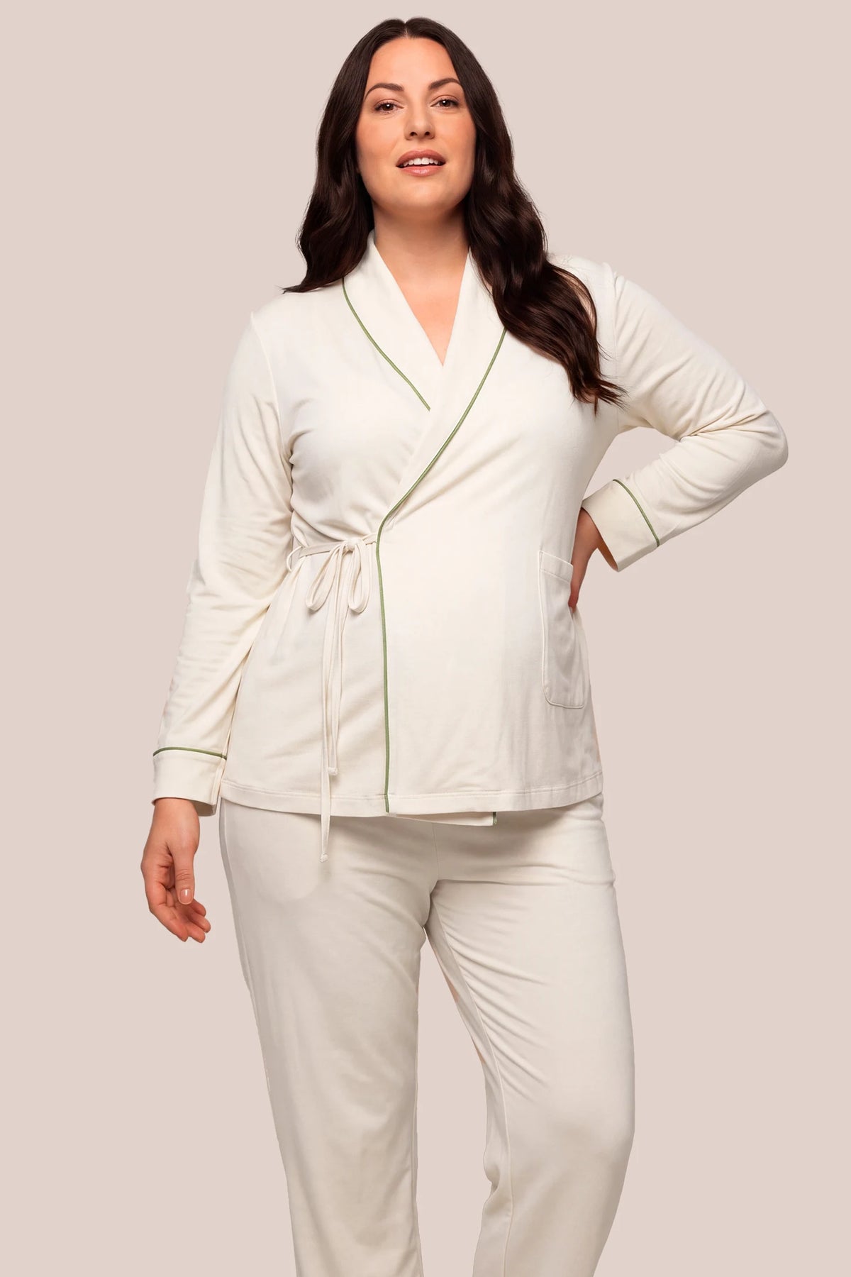 Cotton Wrap Front Long Sleeve Top Wide Leg Pants Maternity Sleepwear Cotton Wrap Front Long Sleeve Top Wide Leg Pants Maternity Sleepwear in Beige featuring a wrap front neckline, built-in bust support, adjustable waist fit, and relaxed wide-leg silhouette on a plus-size pregnant model, front view.