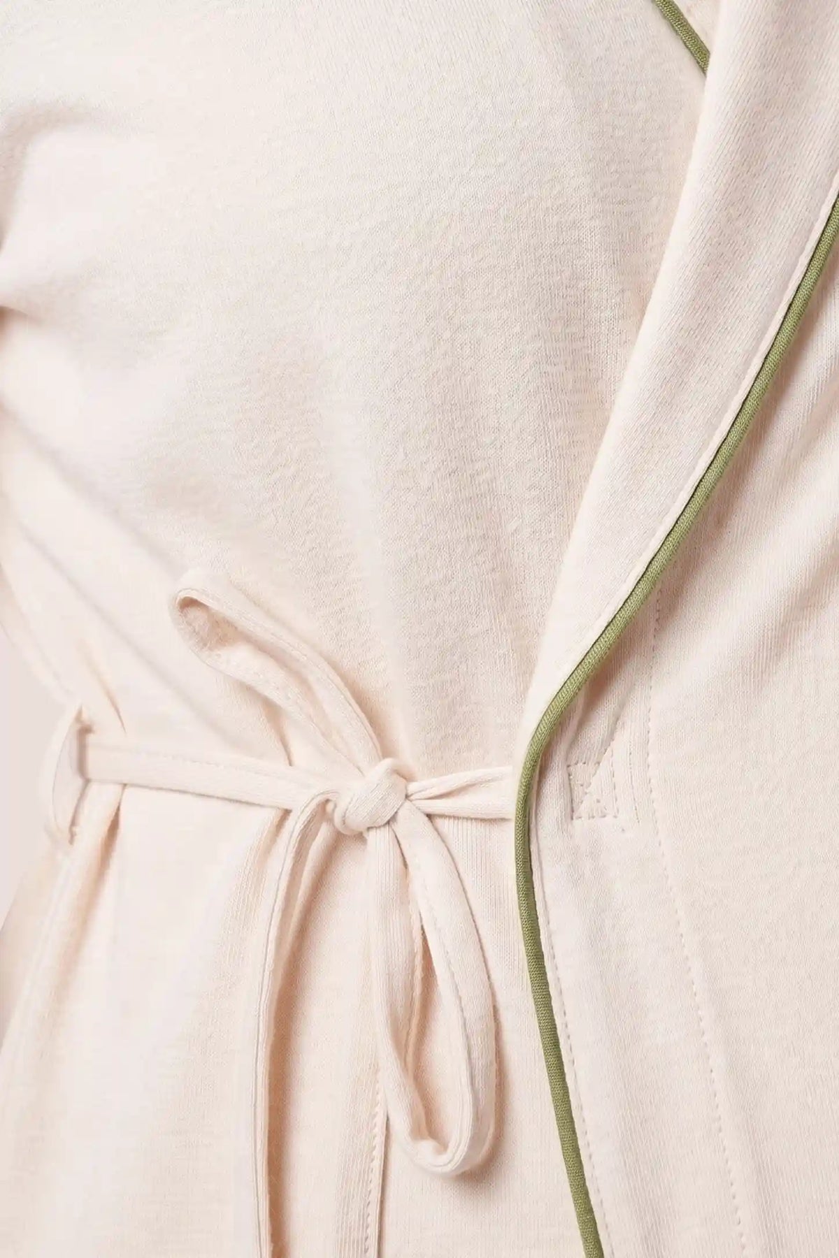 Cotton Wrap Front Long Sleeve Top Wide Leg Pants Maternity Sleepwear Cotton Wrap Front Long Sleeve Top Wide Leg Pants Maternity Sleepwear in Beige featuring soft cotton fabric with a comfortable feel, lightweight texture, and breathable construction shown in a close-up fabric view.