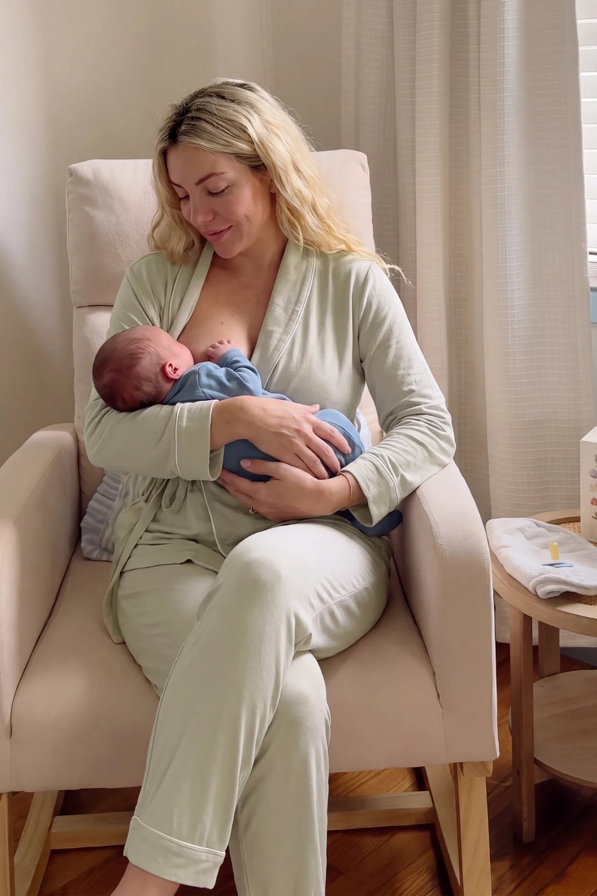 Cotton Wrap Front Long Sleeve Top Wide Leg Pants Maternity Sleepwear Cotton Wrap Front Long Sleeve Top Wide Leg Pants Maternity Sleepwear in Light Green featuring soft cotton fabric, comfortable long sleeves, and wide-leg pants on a pregnant model enjoying a relaxed indoor setting.
