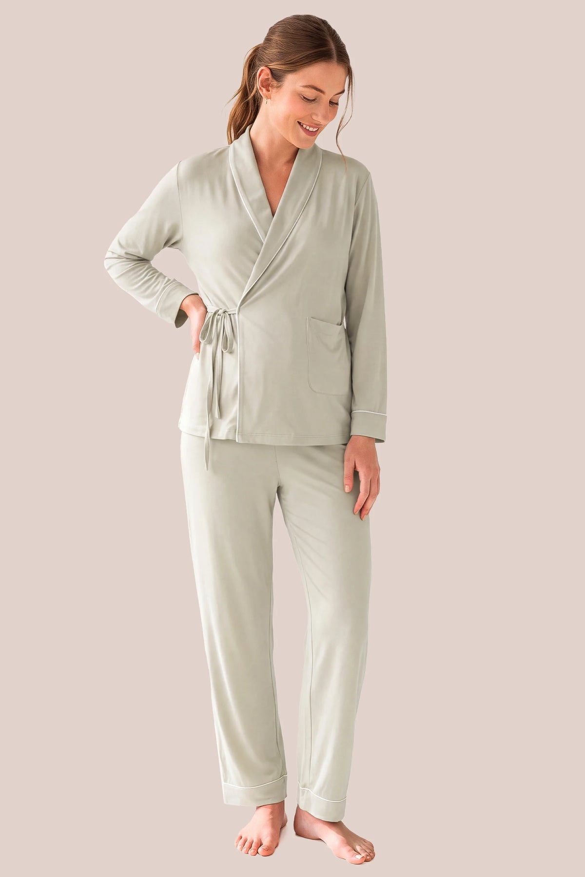 Cotton Wrap Front Long Sleeve Top Wide Leg Pants Maternity Sleepwear Cotton Wrap Front Long Sleeve Top Wide Leg Pants Maternity Sleepwear in Light Green featuring a comfortable wrap front neckline, built-in bust support, adjustable waist fit, and relaxed silhouette on a postpartum model, front view.