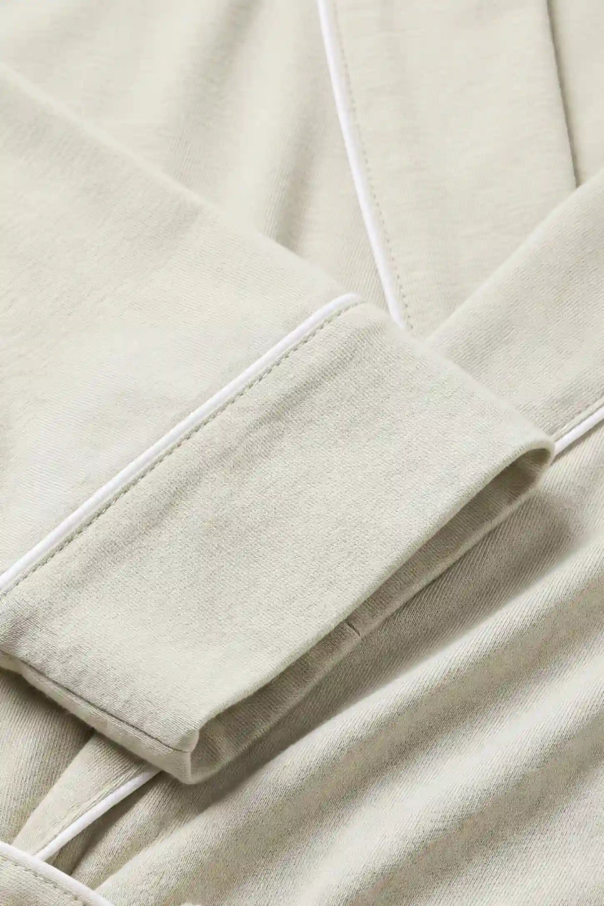 Cotton Wrap Front Long Sleeve Top Wide Leg Pants Maternity Sleepwear Cotton Wrap Front Long Sleeve Top Wide Leg Pants Maternity Sleepwear in Light Green featuring soft cotton fabric with a comfortable feel, lightweight texture, and breathable construction shown in a close-up fabric view.