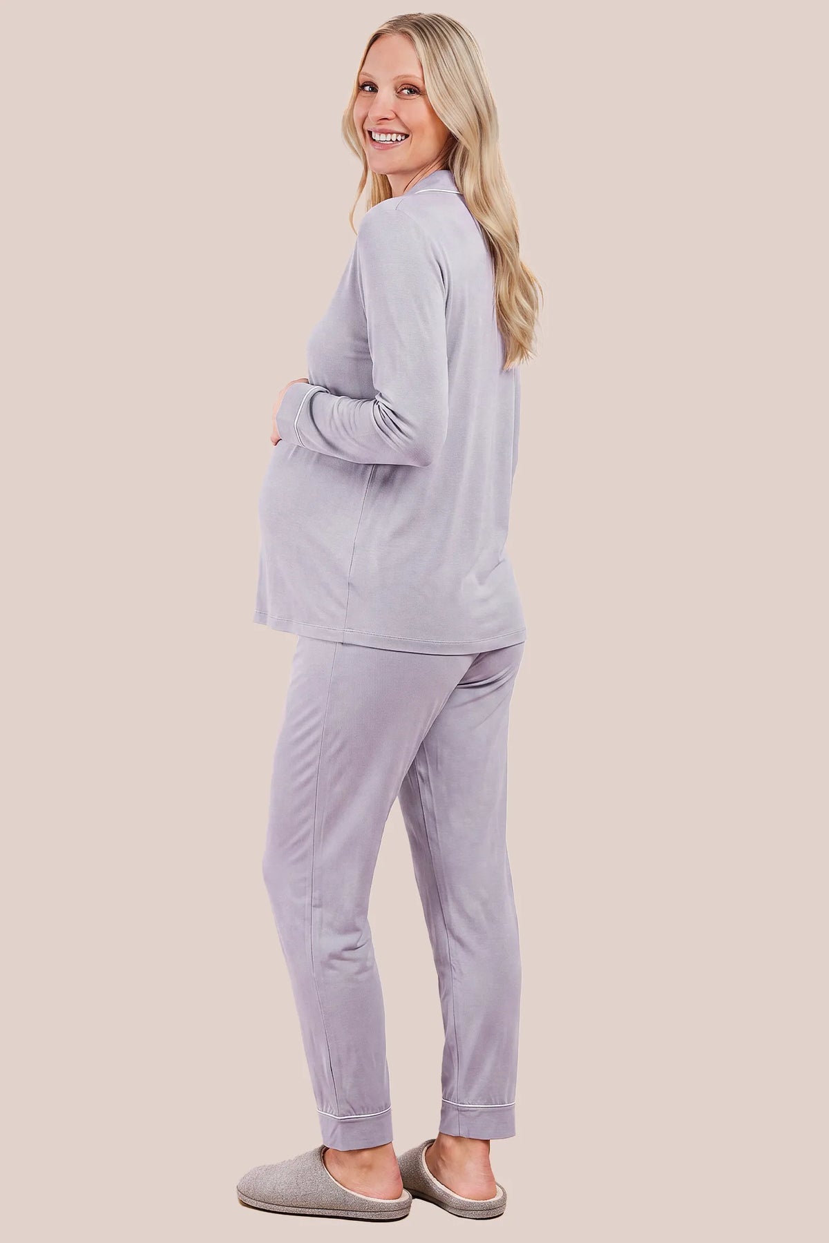 Cotton Wrap Front Long Sleeve Top Wide Leg Pants Maternity Sleepwear Cotton Wrap Front Long Sleeve Top Wide Leg Pants Maternity Sleepwear in Purple featuring a relaxed back design, long sleeves, wide-leg pants, and a comfortable maternity-friendly silhouette on a pregnant model, back view.