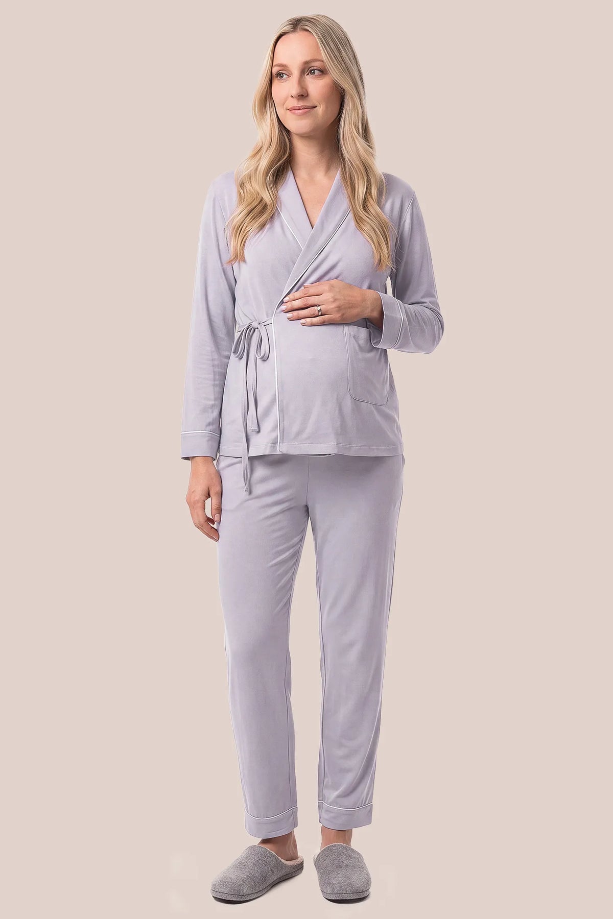 Cotton Wrap Front Long Sleeve Top Wide Leg Pants Maternity Sleepwear Cotton Wrap Front Long Sleeve Top Wide Leg Pants Maternity Sleepwear in Purple featuring a comfortable wrap front neckline, relaxed sleeve openings, built-in bust support, neatly folded hems, and an adjustable waist fit on a pregnant model, front view.