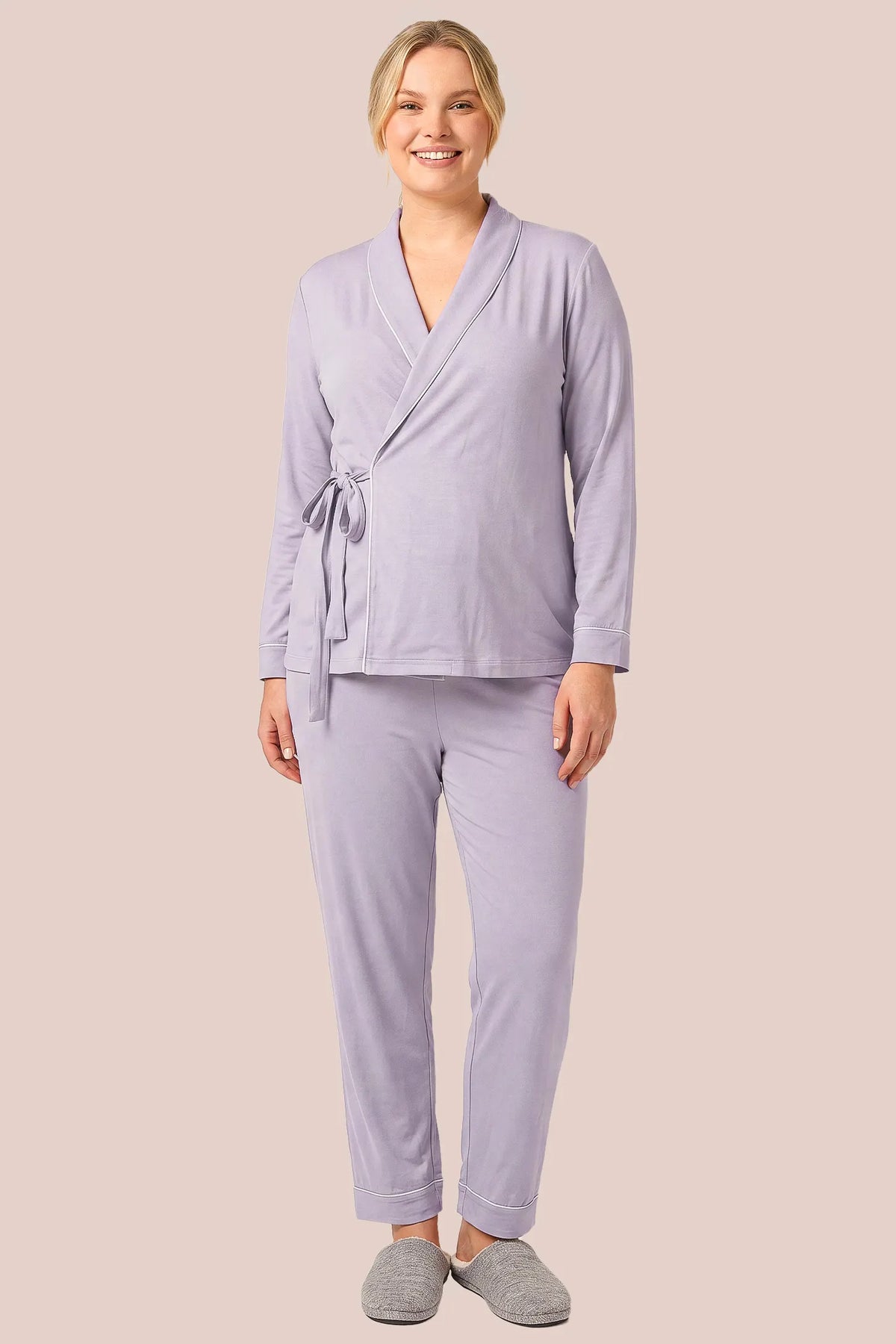 Cotton Wrap Front Long Sleeve Top Wide Leg Pants Maternity Sleepwear Cotton Wrap Front Long Sleeve Top Wide Leg Pants Maternity Sleepwear in Purple featuring a wrap front neckline, built-in bust support, adjustable waist fit, and relaxed wide-leg silhouette on a plus-size pregnant model, front view.