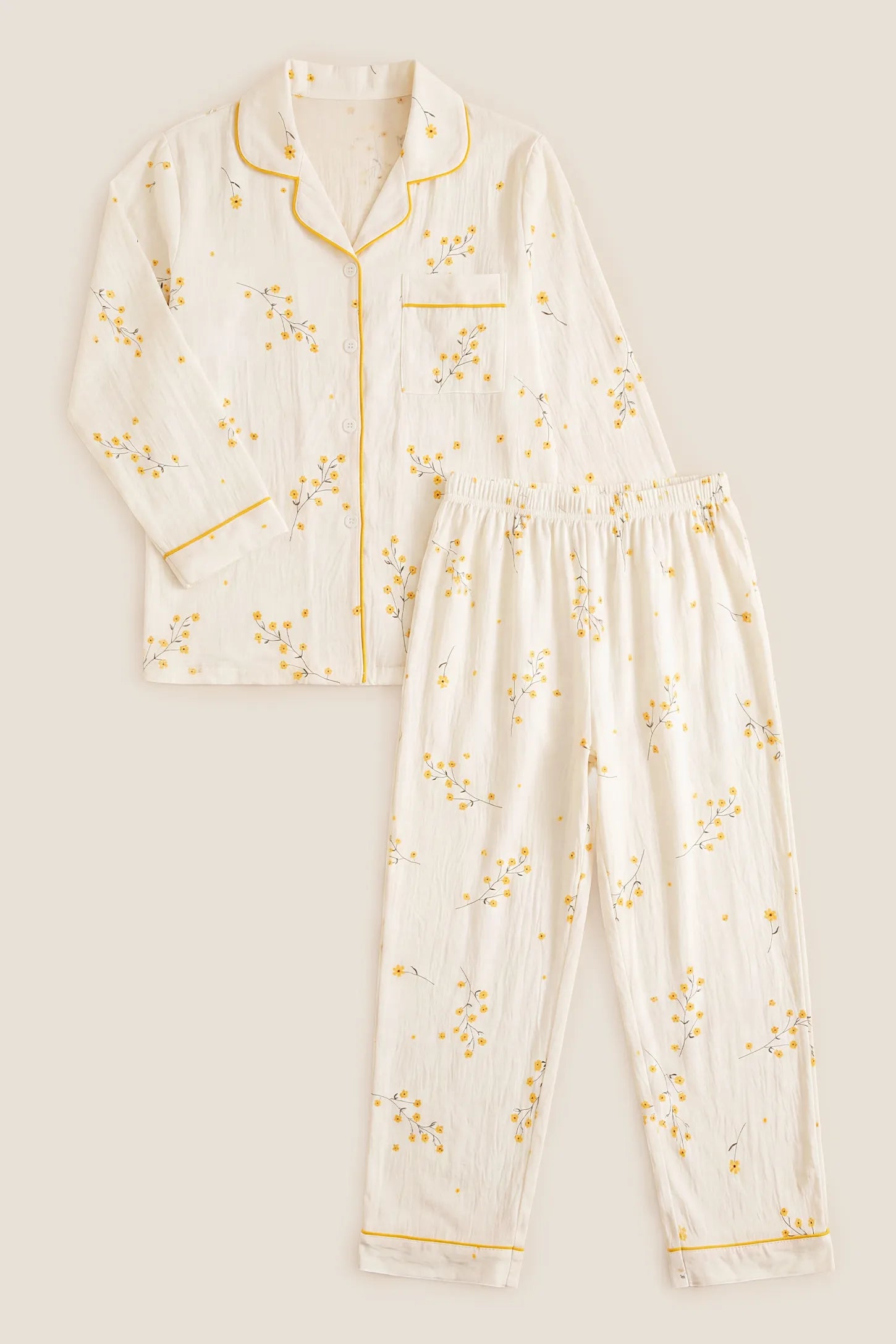 Cozy Floral Cotton Maternity Pajama Set Cozy Floral Cotton Maternity Pajama Set in Yellow Daisy featuring the complete two-piece sleepwear layout with long sleeve button-front top and elastic waistband long pants, flat lay product tile view.