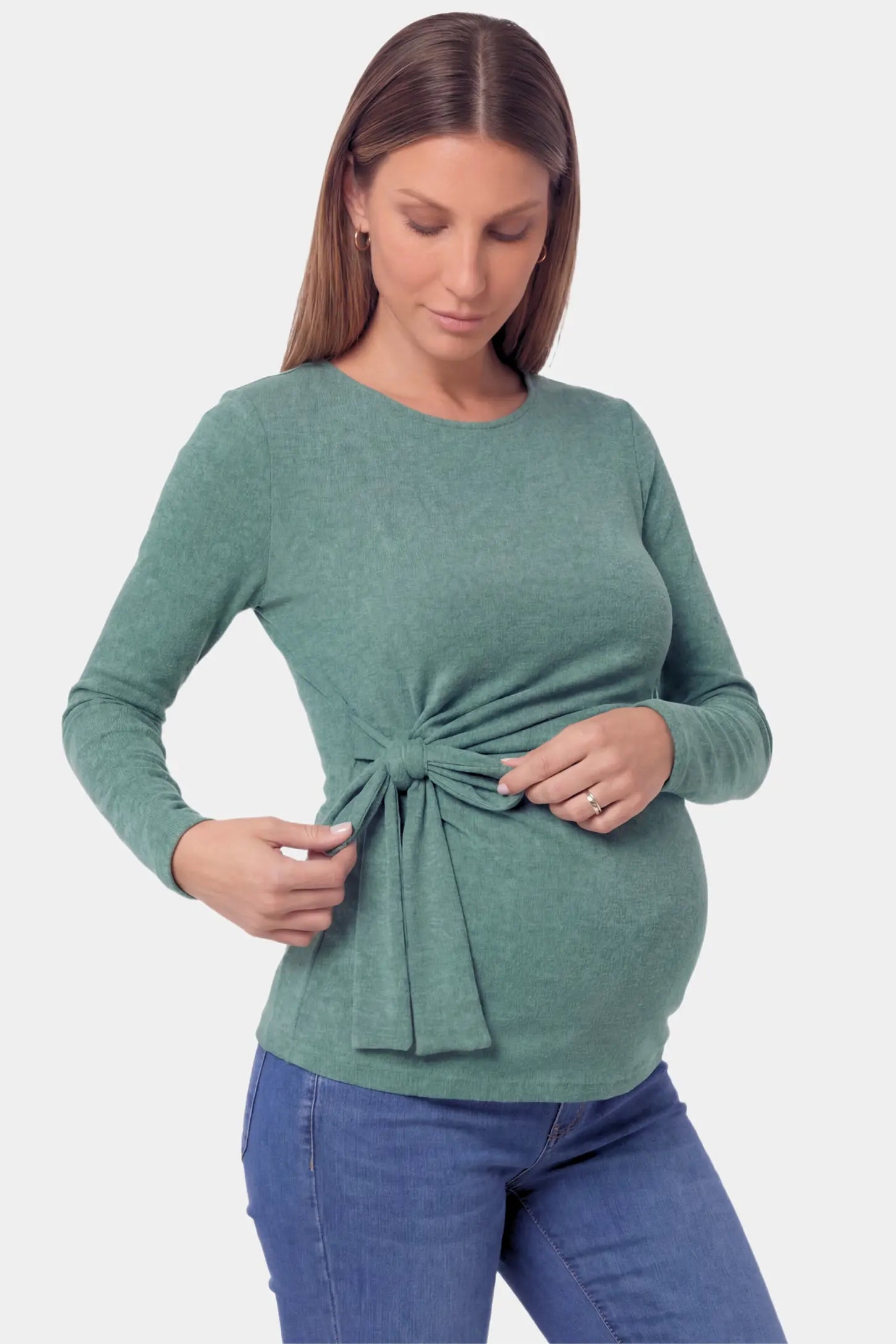Crew Neck Long Sleeve with Side Tie Maternity Top in green featuring an adjustable side tie and crew neckline on a pregnant model.