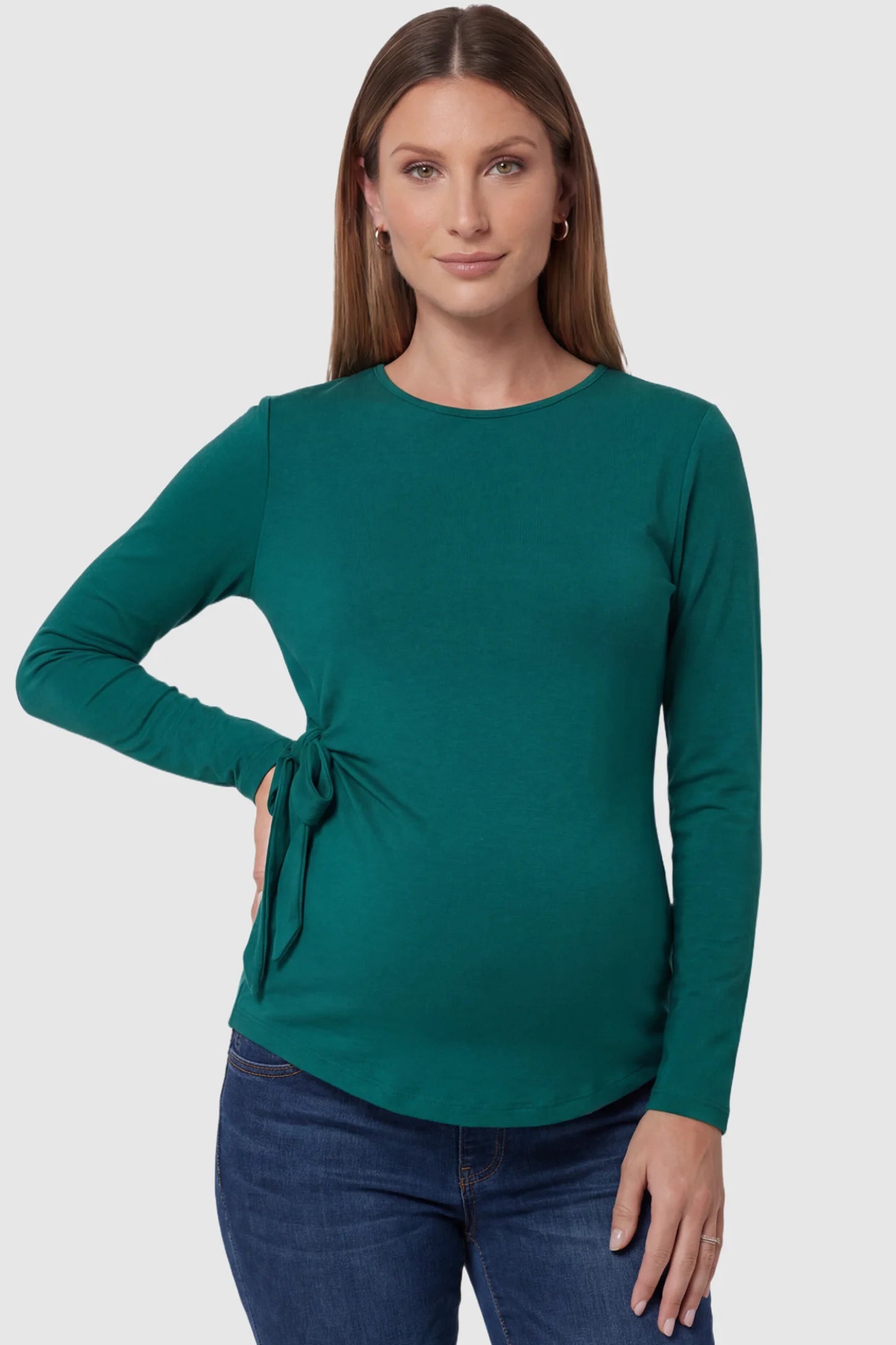 Crew Neck Long Sleeve with Side Tie Maternity Top in green featuring an adjustable side tie and crew neckline on a pregnant model front view.