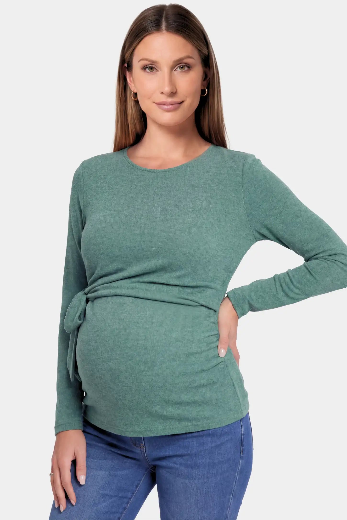 Crew Neck Long Sleeve with Side Tie Maternity Top in green featuring an adjustable side tie and crew neckline on a pregnant model.