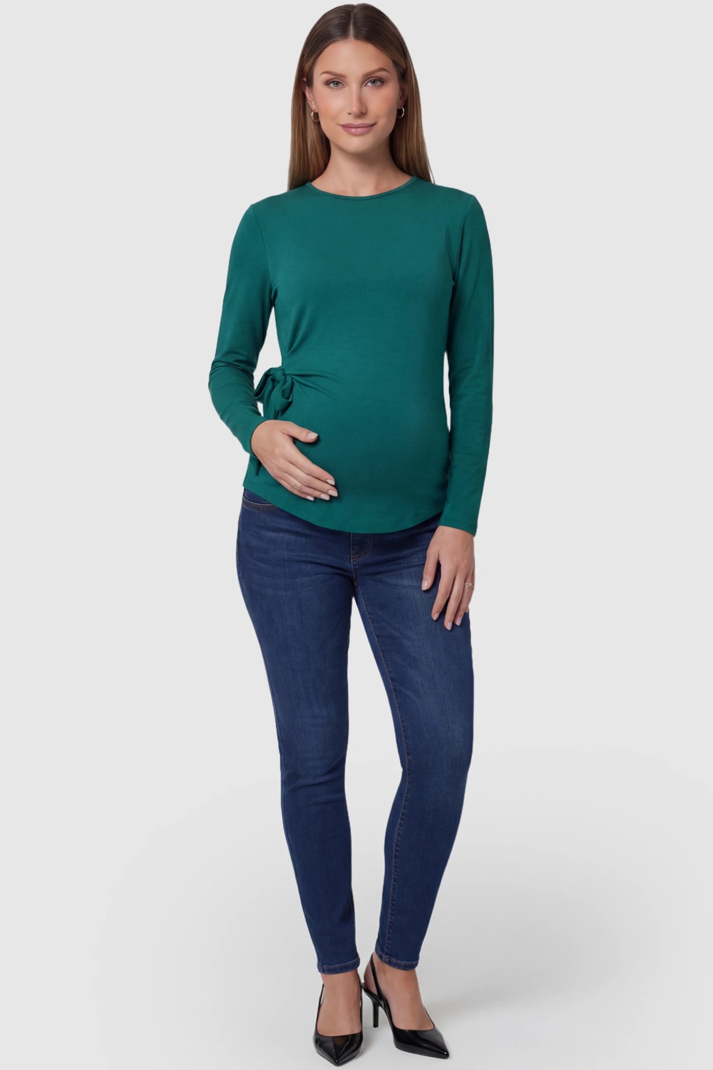 Crew Neck Long Sleeve with Side Tie Maternity Top Crew Neck Long Sleeve with Side Tie Maternity Top in green featuring an adjustable side tie and crew neckline on a pregnant model fullbody view.
