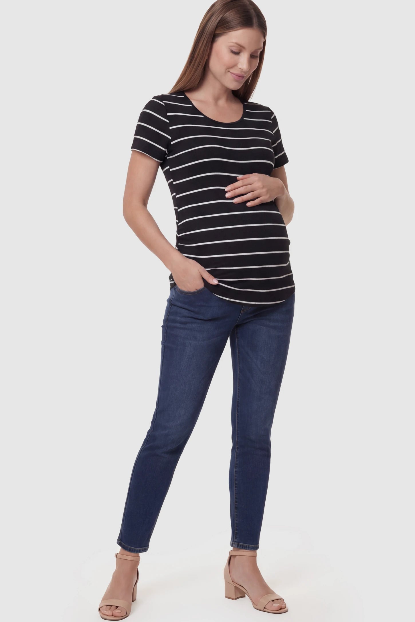 Striped Crew Neck Short Sleeve Maternity Top Striped crew neck short sleeve maternity top in black and white shown in full body view on a pregnant model