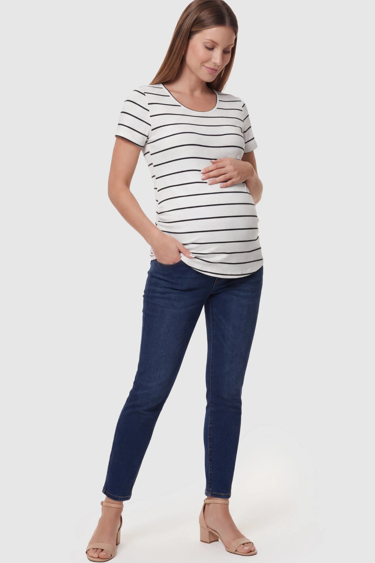 Striped Crew Neck Short Sleeve Maternity Top Striped crew neck short sleeve maternity top in white and black shown in full body view on a pregnant model