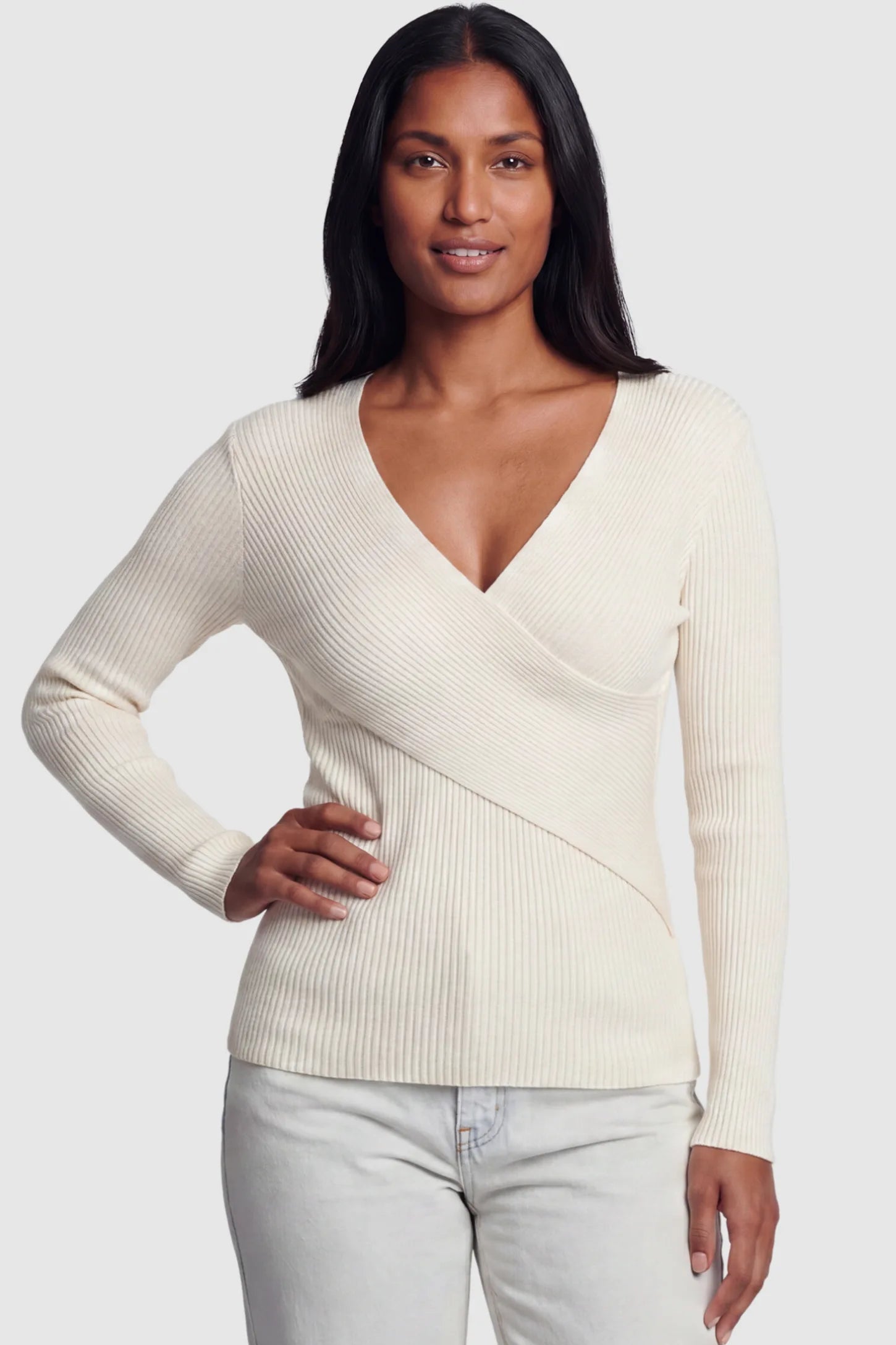 Cross-Over Ribbed Knit Maternity & Nursing Top Cross-Over Ribbed Knit Maternity & Nursing Top in Apricot featuring a wrap neckline and textured finish on a postpartum model, front view.