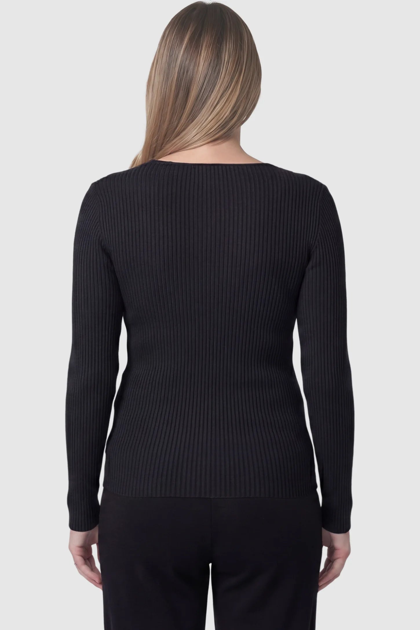 Cross-Over Ribbed Knit Maternity & Nursing Top Cross-Over Ribbed Knit Maternity & Nursing Top in Black featuring textured finish on a pregnant model, back view.