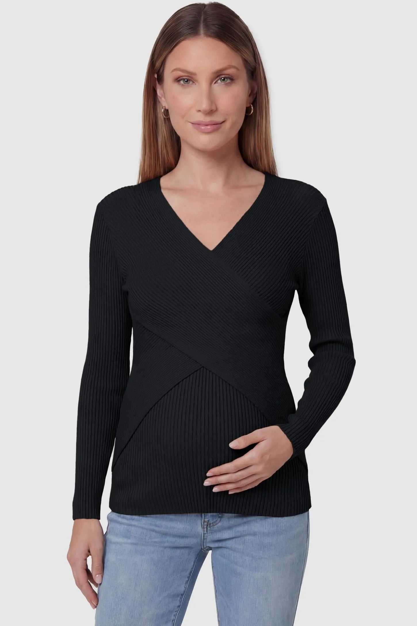Cross-Over Ribbed Knit Maternity & Nursing Top Cross-Over Ribbed Knit Maternity & Nursing Top in Black featuring a wrap neckline and textured finish on a pregnant model, front view.