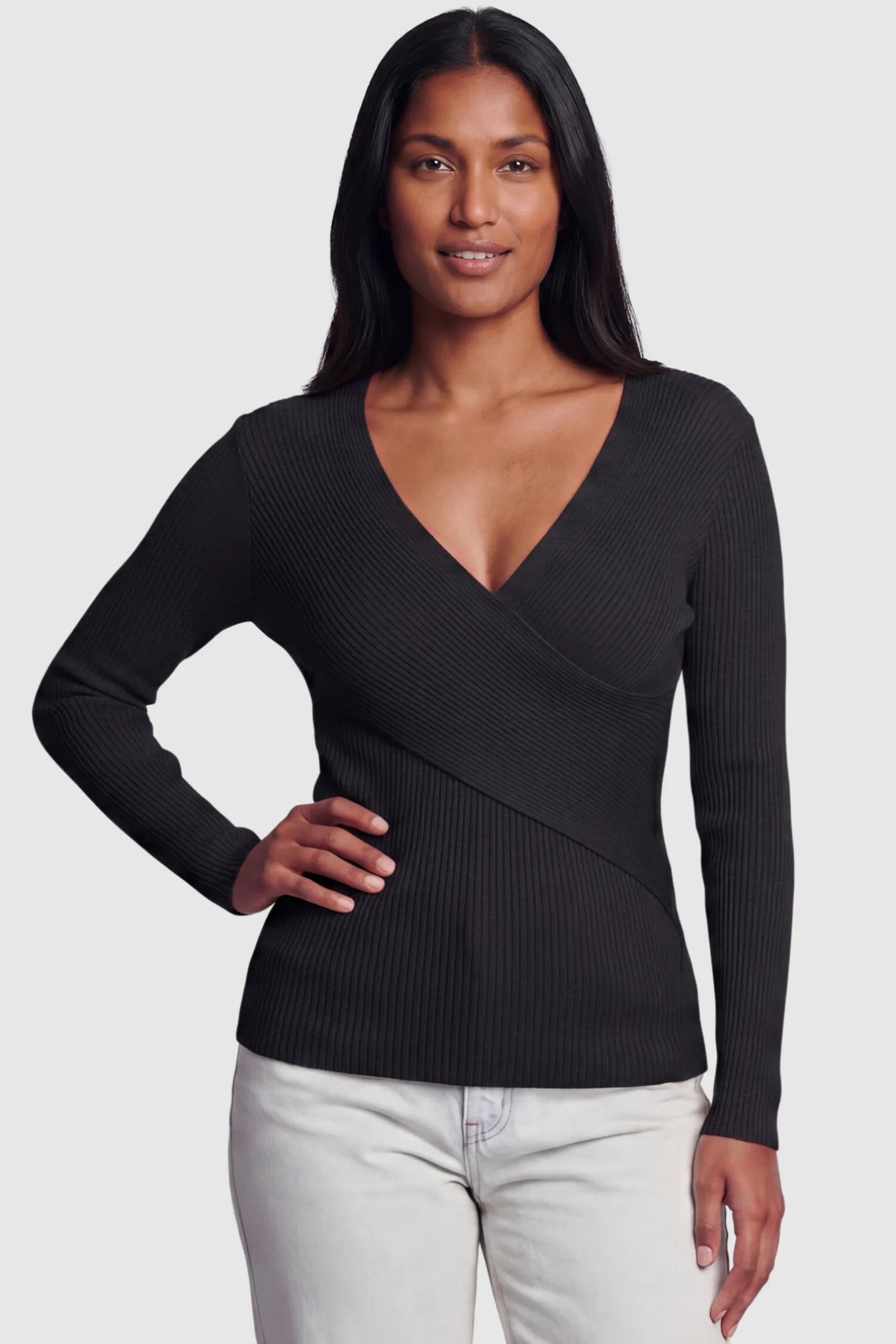 Cross-Over Ribbed Knit Maternity & Nursing Top Cross-Over Ribbed Knit Maternity & Nursing Top in Black featuring a wrap neckline and textured finish on a postpartum model, front view.