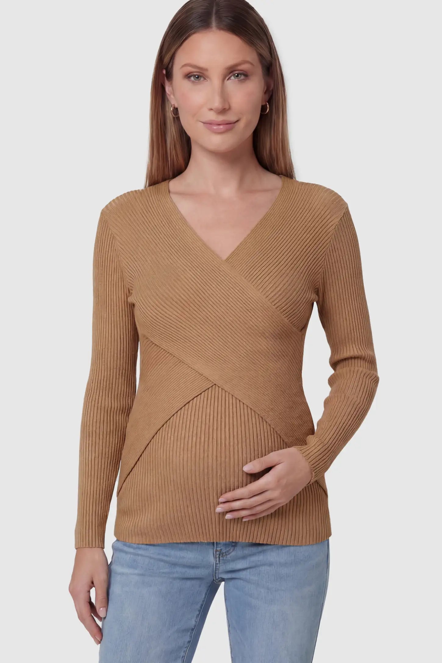 Cross-Over Ribbed Knit Maternity & Nursing Top Cross-Over Ribbed Knit Maternity & Nursing Top in Coffee featuring a wrap neckline and textured finish on a pregnant model, front view.