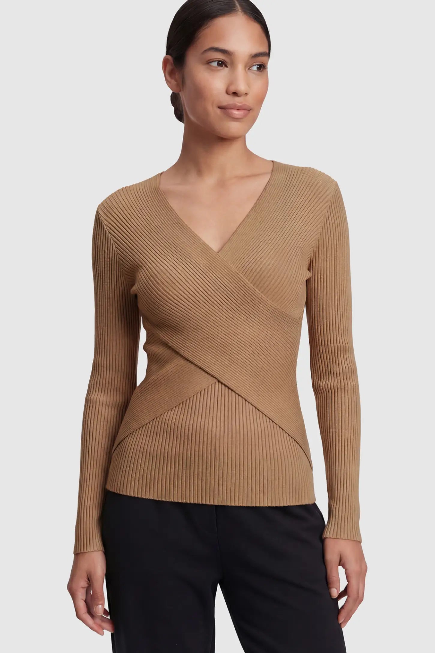 Cross-Over Ribbed Knit Maternity & Nursing Top Cross-Over Ribbed Knit Maternity & Nursing Top in Coffee featuring a wrap neckline and textured finish on a non-pregnant model.