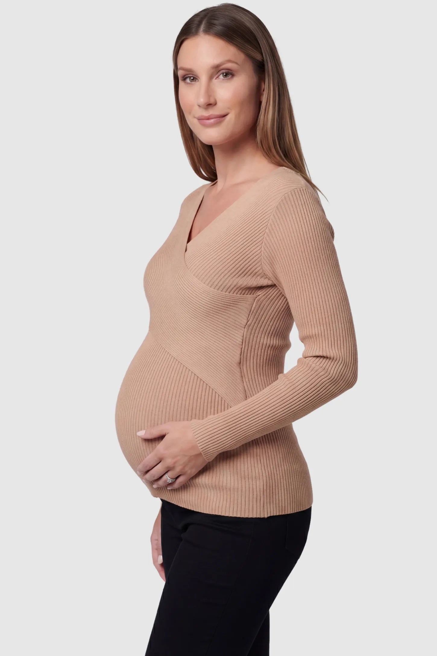 Cross-Over Ribbed Knit Maternity & Nursing Top Cross-Over Ribbed Knit Maternity & Nursing Top in Khaki featuring a wrap neckline and textured finish on a pregnant model, side view.