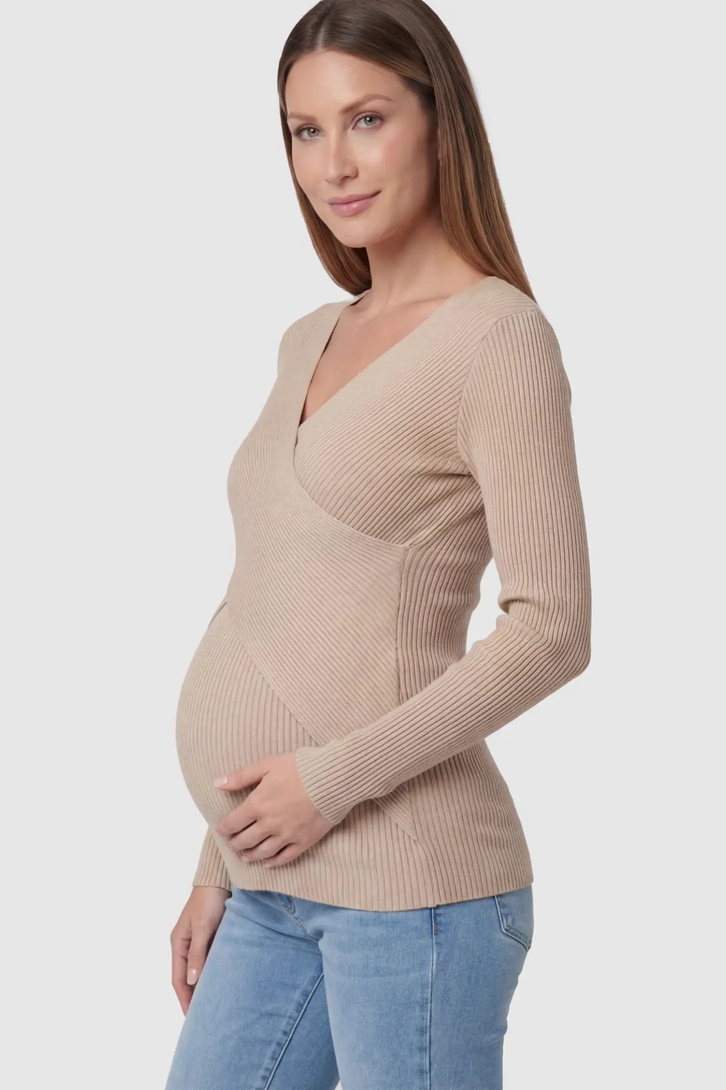 Cross-Over Ribbed Knit Maternity & Nursing Top Cross-Over Ribbed Knit Maternity & Nursing Top in Khaki featuring a wrap neckline and textured finish on a pregnant model, side view.