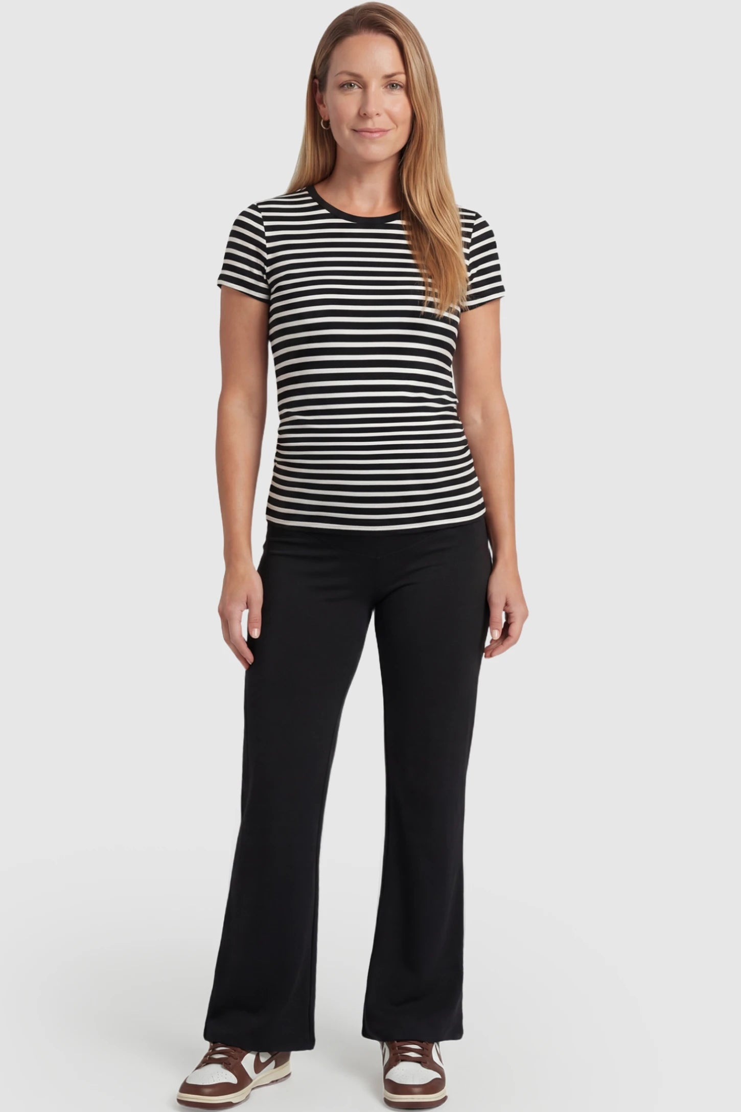 Cross Over High-Waisted Wide-Leg Maternity Pants Cross Over High-Waisted Wide-Leg Maternity Pants in Black with a versatile cross-front design on a postpartum model in front view.