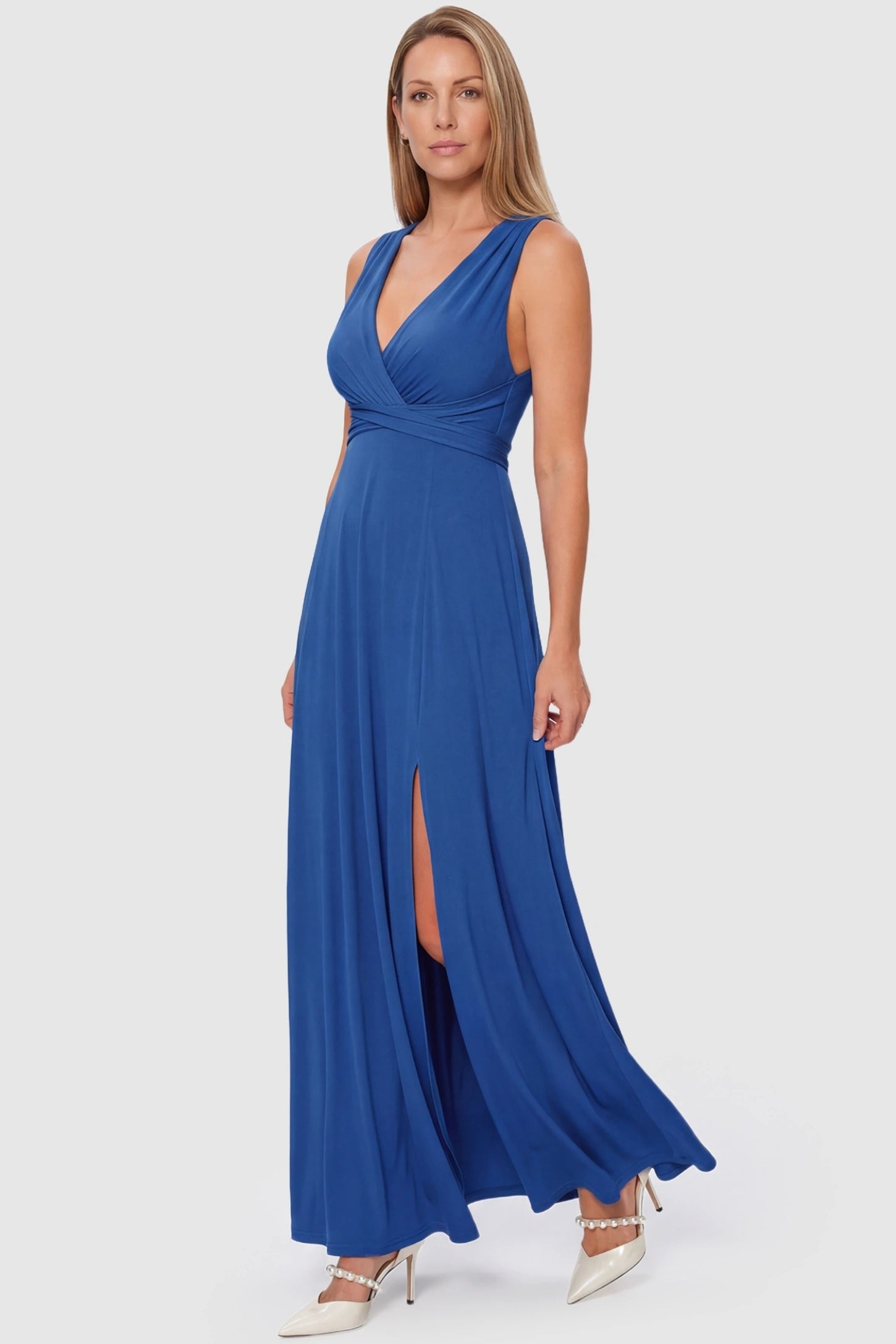 V-Neck Cross-Back Maxi Maternity Dress Blue V-Neck Cross-Back Maxi Maternity Dress showing the versatile drape and front slit on a postpartum model.