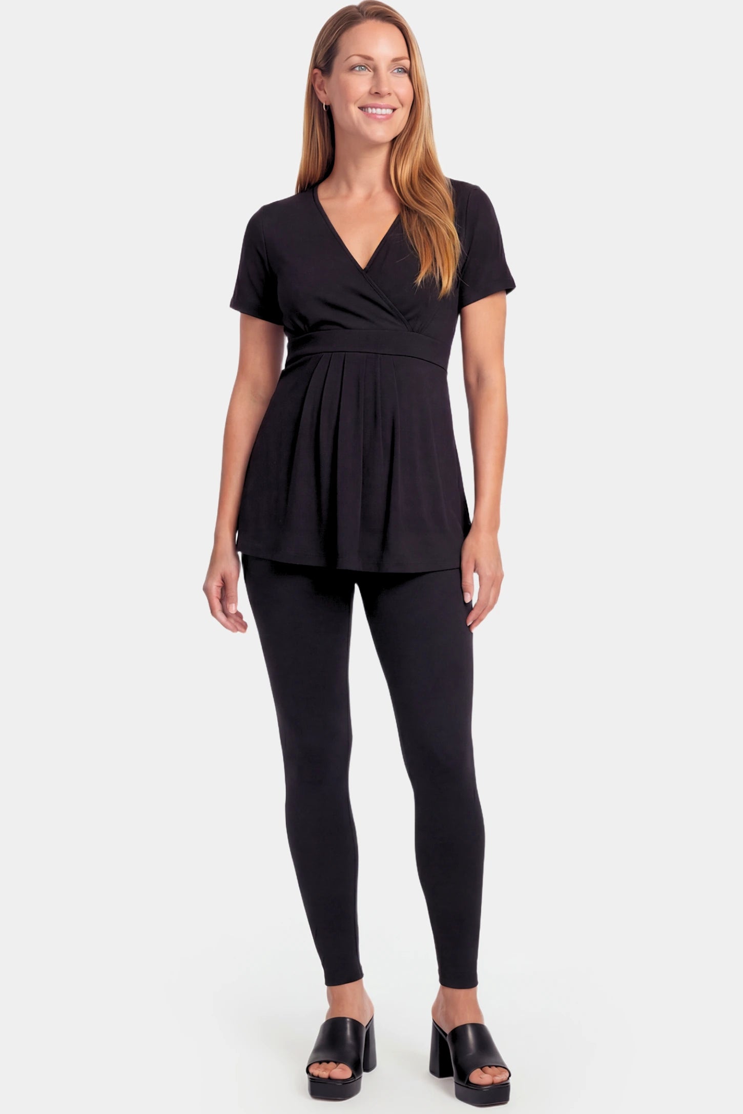Crossover Short Sleeve Maternity & Nursing Top Crossover Short Sleeve Maternity & Nursing Top in black featuring a crossover V-neck and empire waist on a non pregnant model.