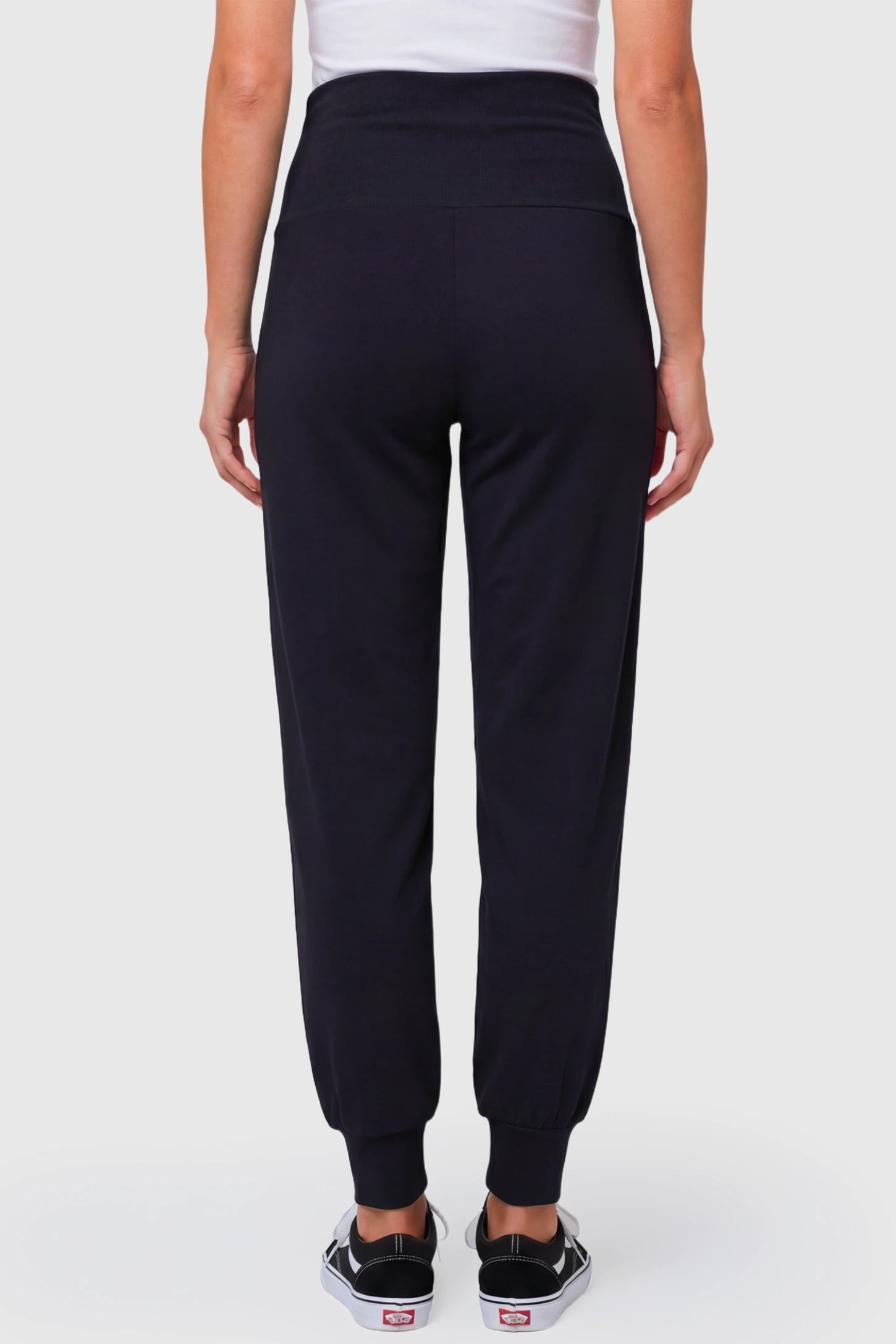 High-Rise Cuffed Maternity Joggers High-Rise Cuffed Maternity Joggers in black featuring over-the-belly support and ribbed cuff hem on pregnant model.