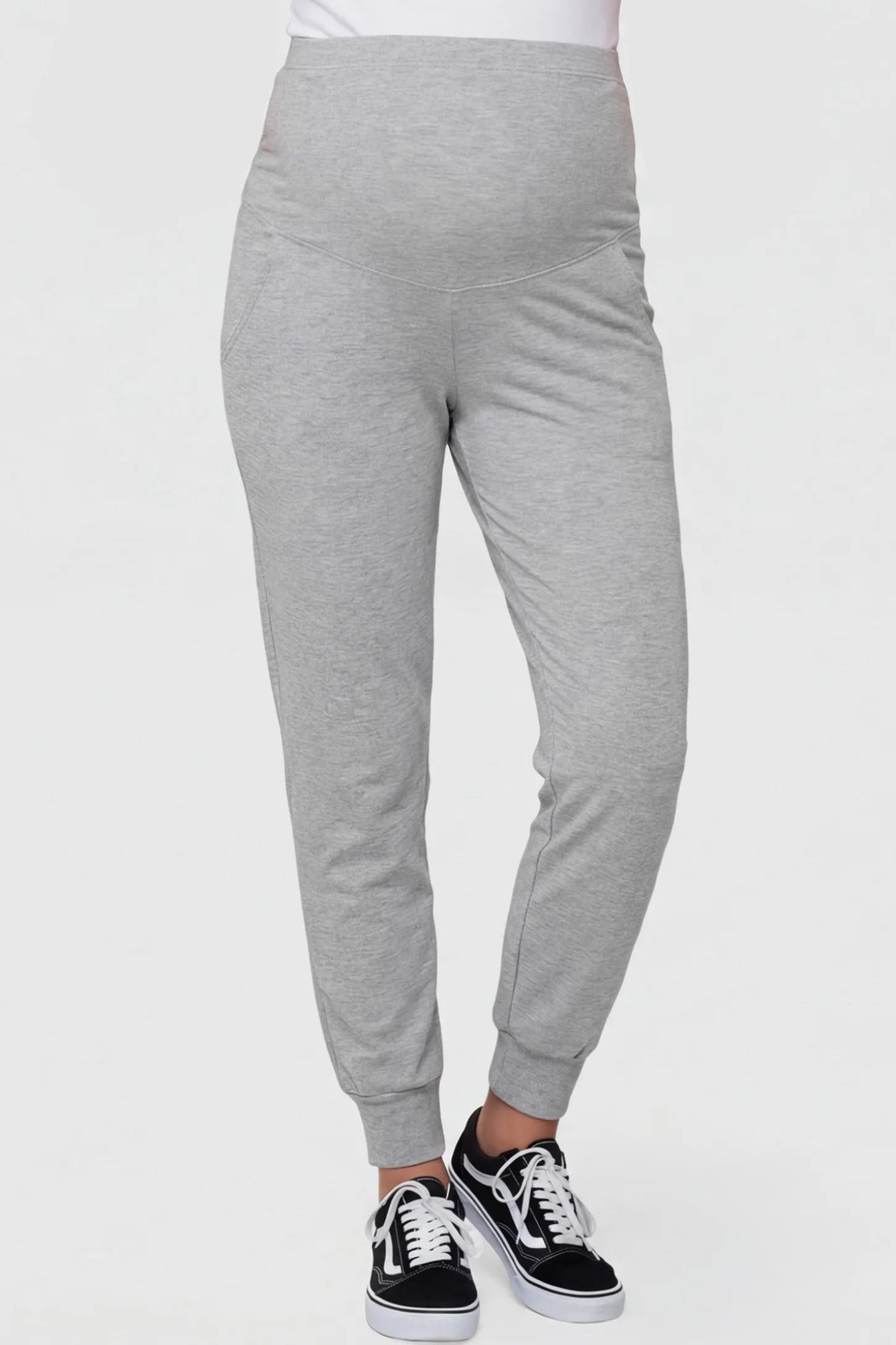High-Rise Cuffed Maternity Joggers High-Rise Cuffed Maternity Joggers in gray featuring over-the-belly support and ribbed cuff hem on pregnant model front view.