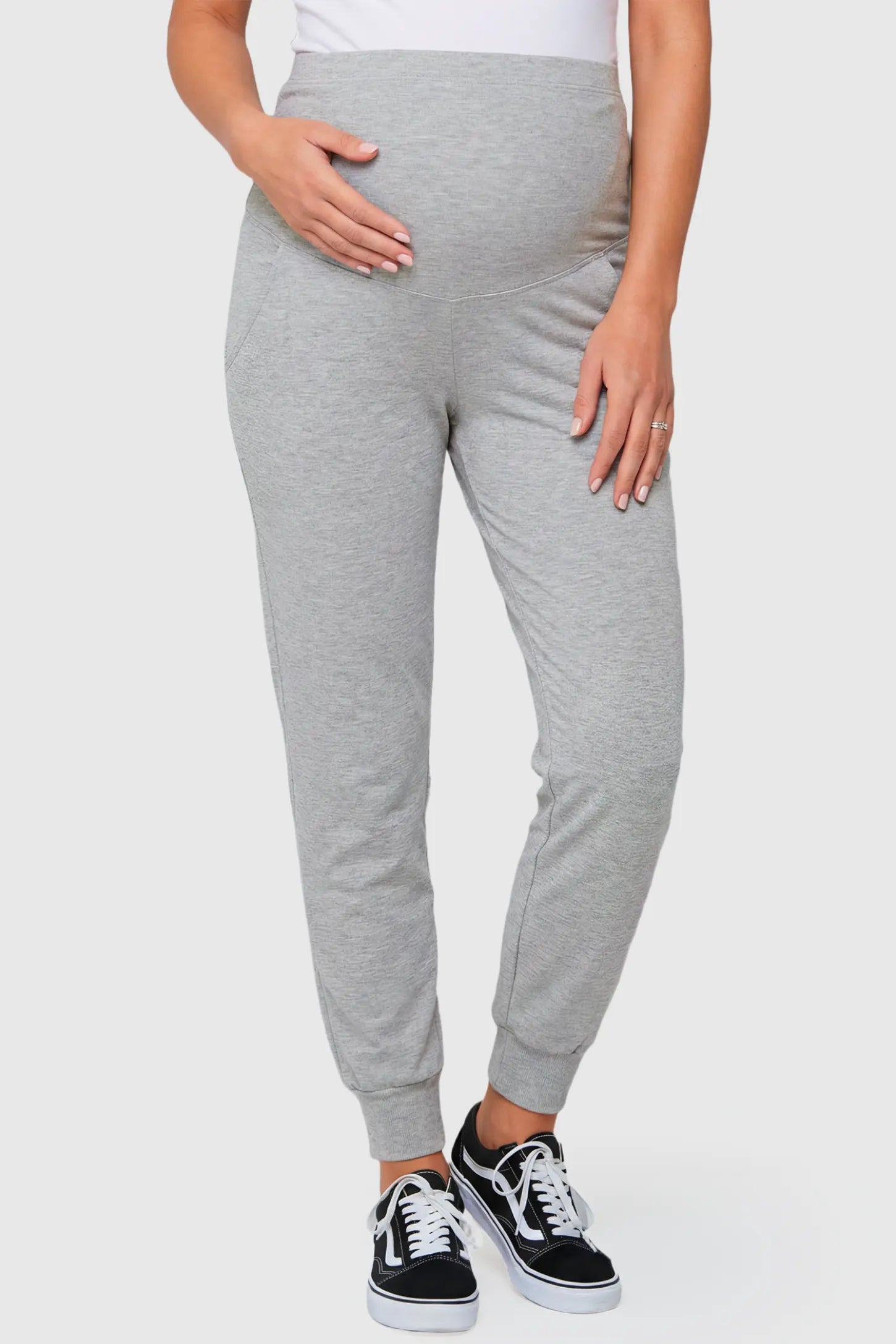 High-Rise Cuffed Maternity Joggers High-Rise Cuffed Maternity Joggers in gray featuring over-the-belly support and ribbed cuff hem on pregnant model.