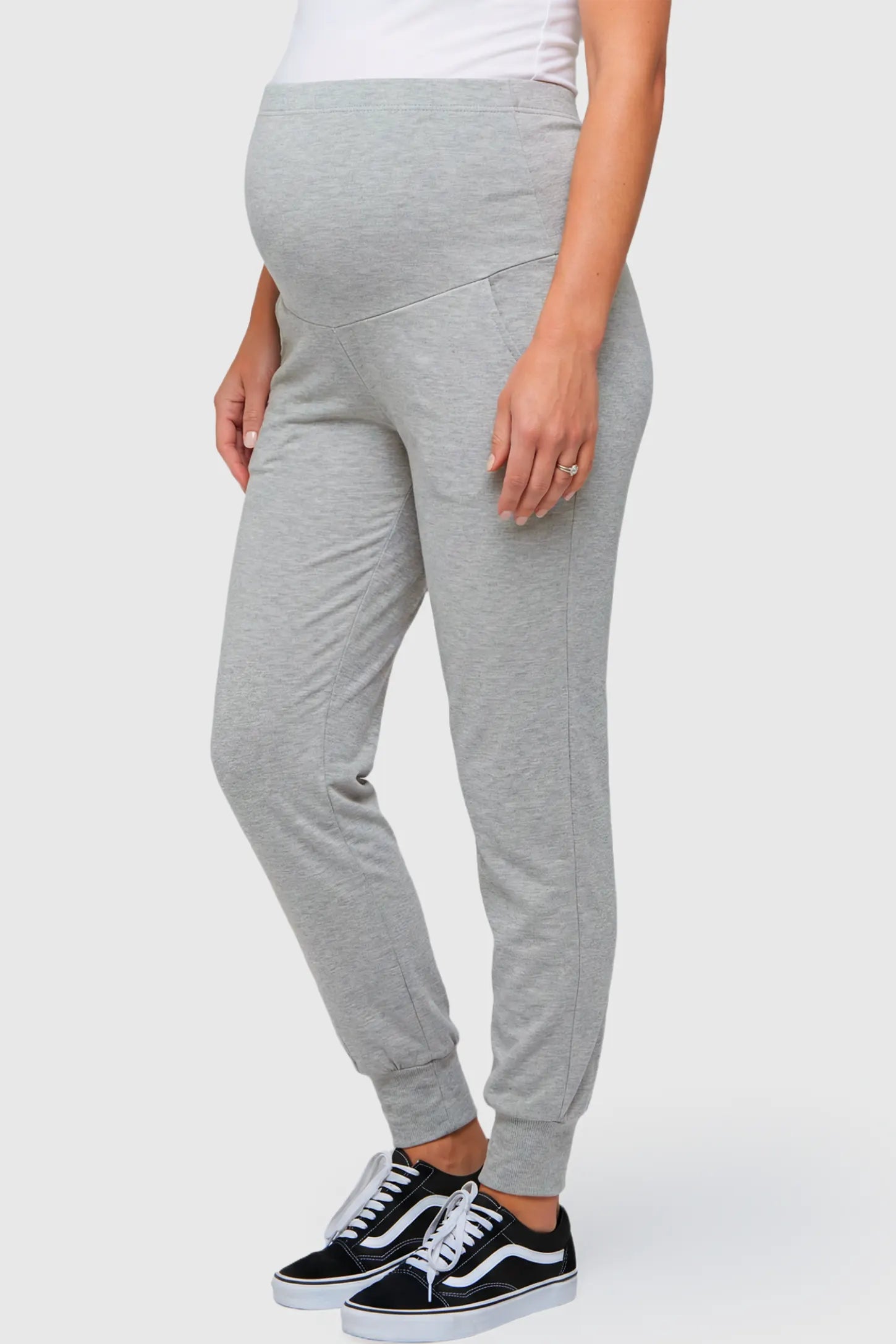 High-Rise Cuffed Maternity Joggers High-Rise Cuffed Maternity Joggers in gray featuring over-the-belly support and ribbed cuff hem on pregnant model.