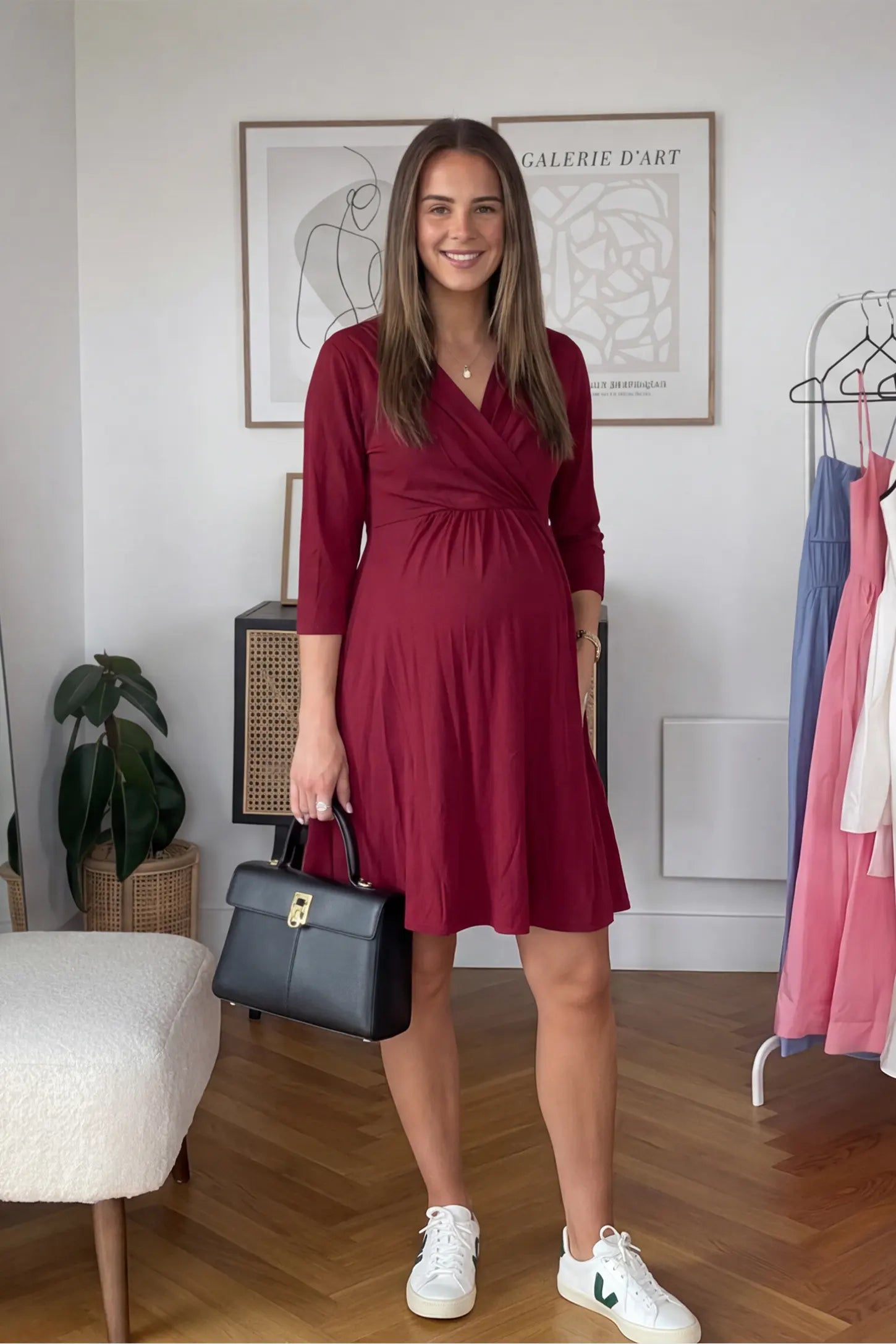 Crossover A-Line Maternity & Nursing Midi Dress Crossover A-line maternity & nursing midi dress in red with wrap-style V-neck bodice, front view on pregnant model