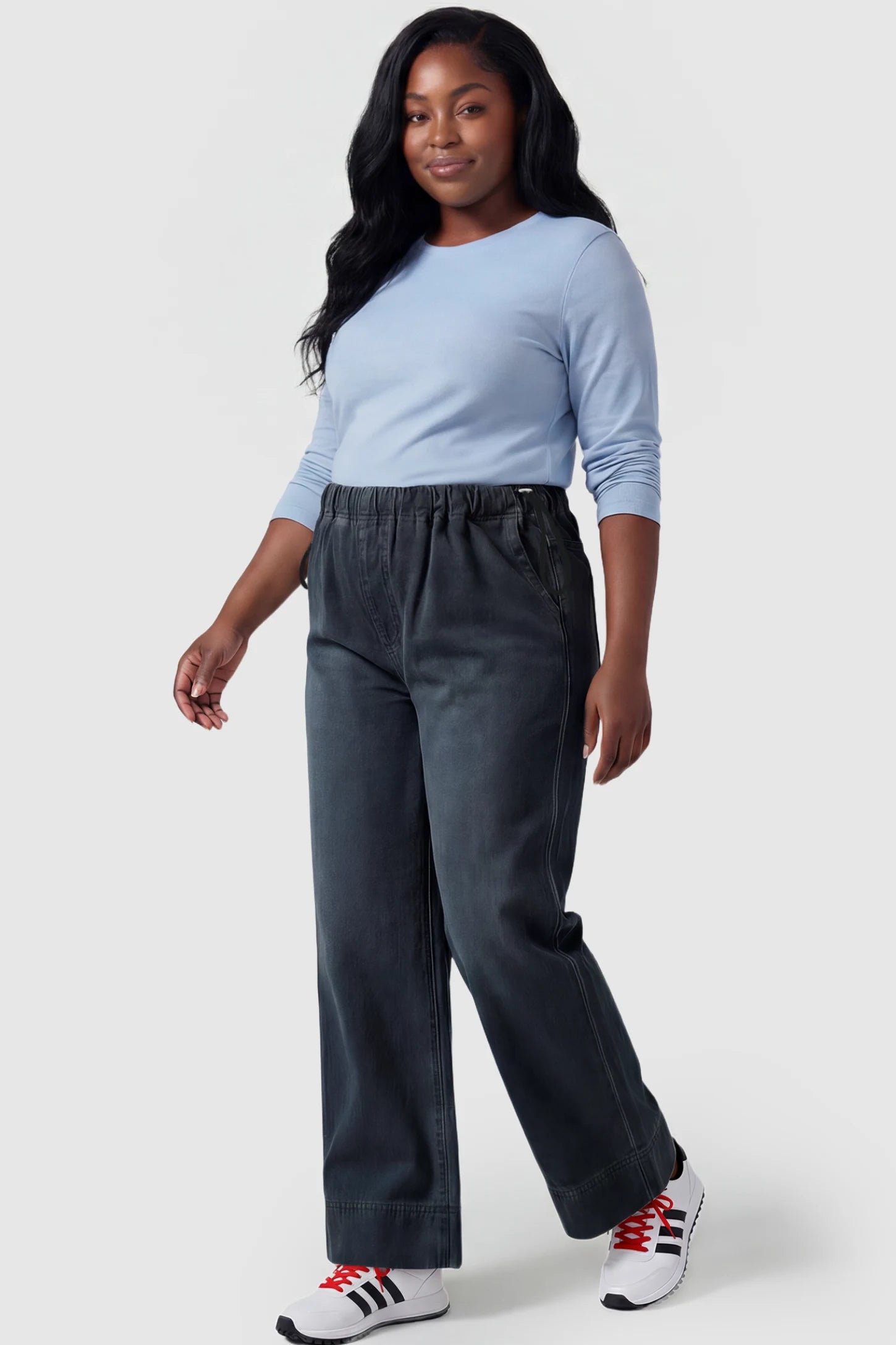Drawstring Wide-Leg Maternity Jeans Drawstring Wide-Leg Maternity Jeans in black featuring adjustable waist and relaxed full-length silhouette on plus size pregnant model front view.