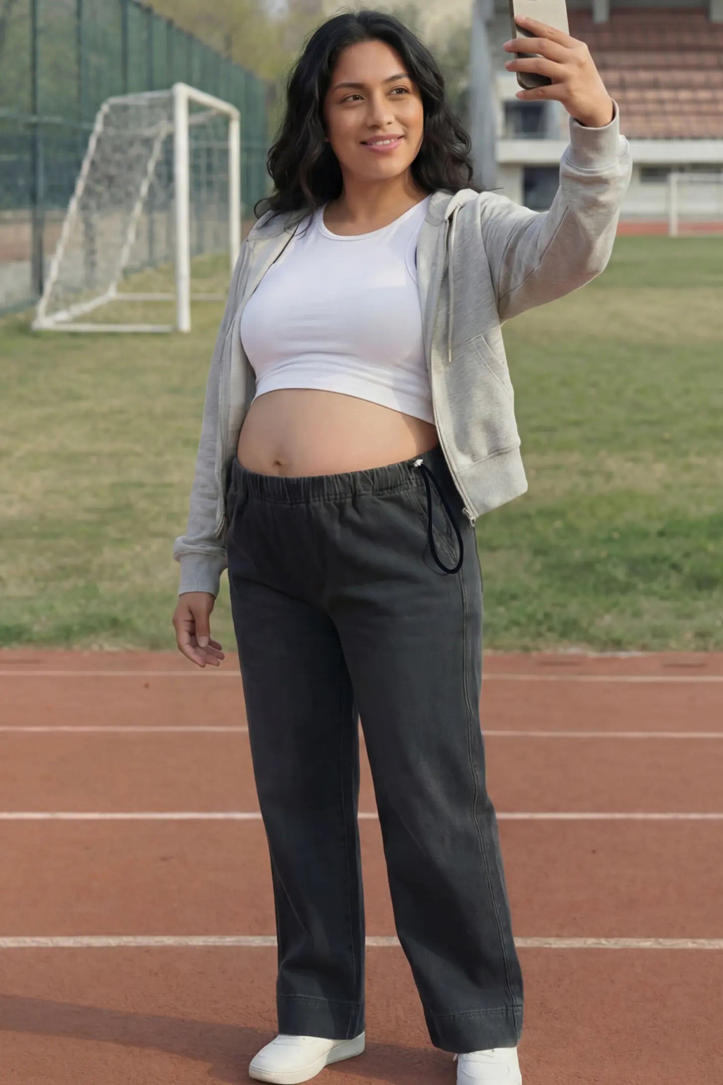 Drawstring Wide-Leg Maternity Jeans Drawstring Wide-Leg Maternity Jeans in black featuring adjustable waist and relaxed full-length silhouette on pregnant model front view.