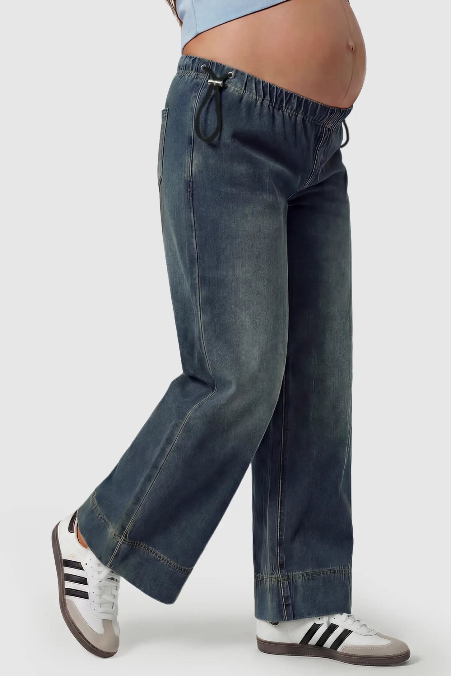 Drawstring Wide-Leg Maternity Jeans Drawstring Wide-Leg Maternity Jeans in cement gray featuring adjustable waist and relaxed full-length silhouette on pregnant model side view.