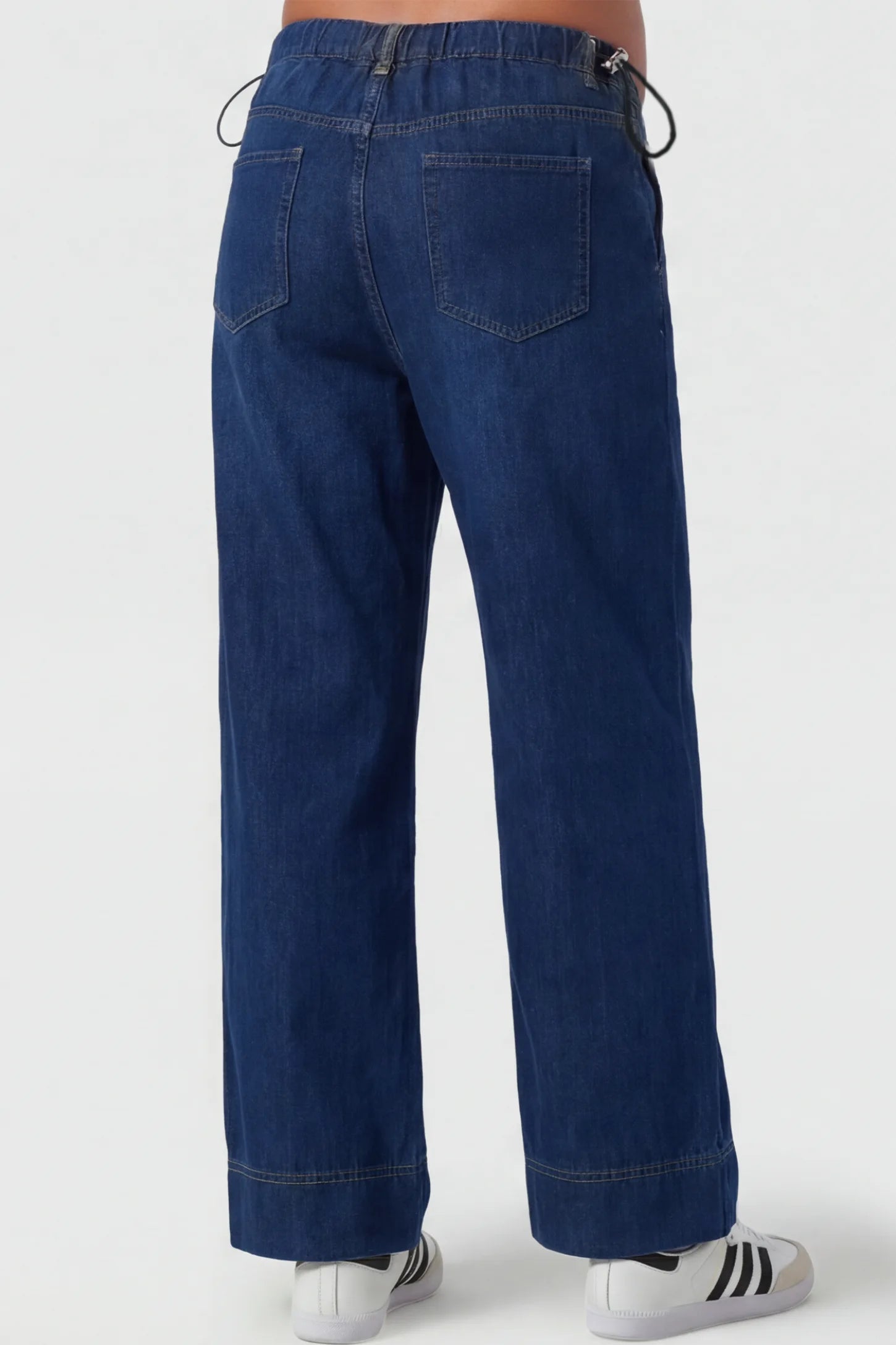 Drawstring Wide-Leg Maternity Jeans Drawstring Wide-Leg Maternity Jeans in dark blue featuring adjustable waist and relaxed full-length silhouette on pregnant model back view.