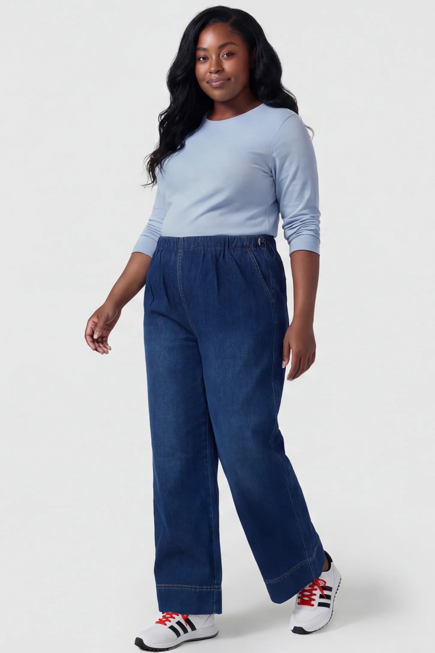 Drawstring Wide-Leg Maternity Jeans Drawstring Wide-Leg Maternity Jeans in dark blue featuring adjustable waist and relaxed full-length silhouette on plus size pregnant model front view.