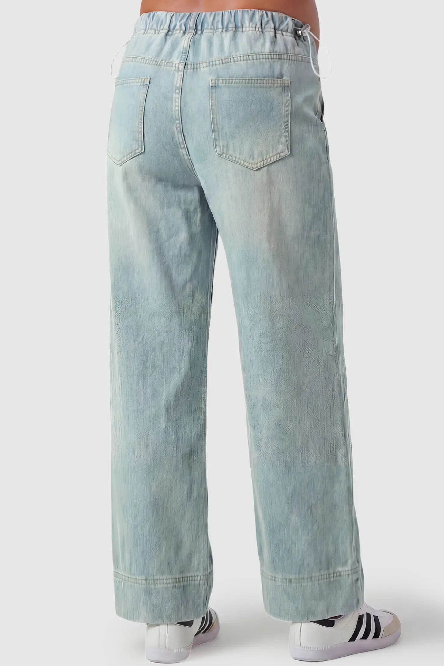 Drawstring Wide-Leg Maternity Jeans Drawstring Wide-Leg Maternity Jeans in light blue featuring adjustable waist and relaxed full-length silhouette on pregnant model back view.